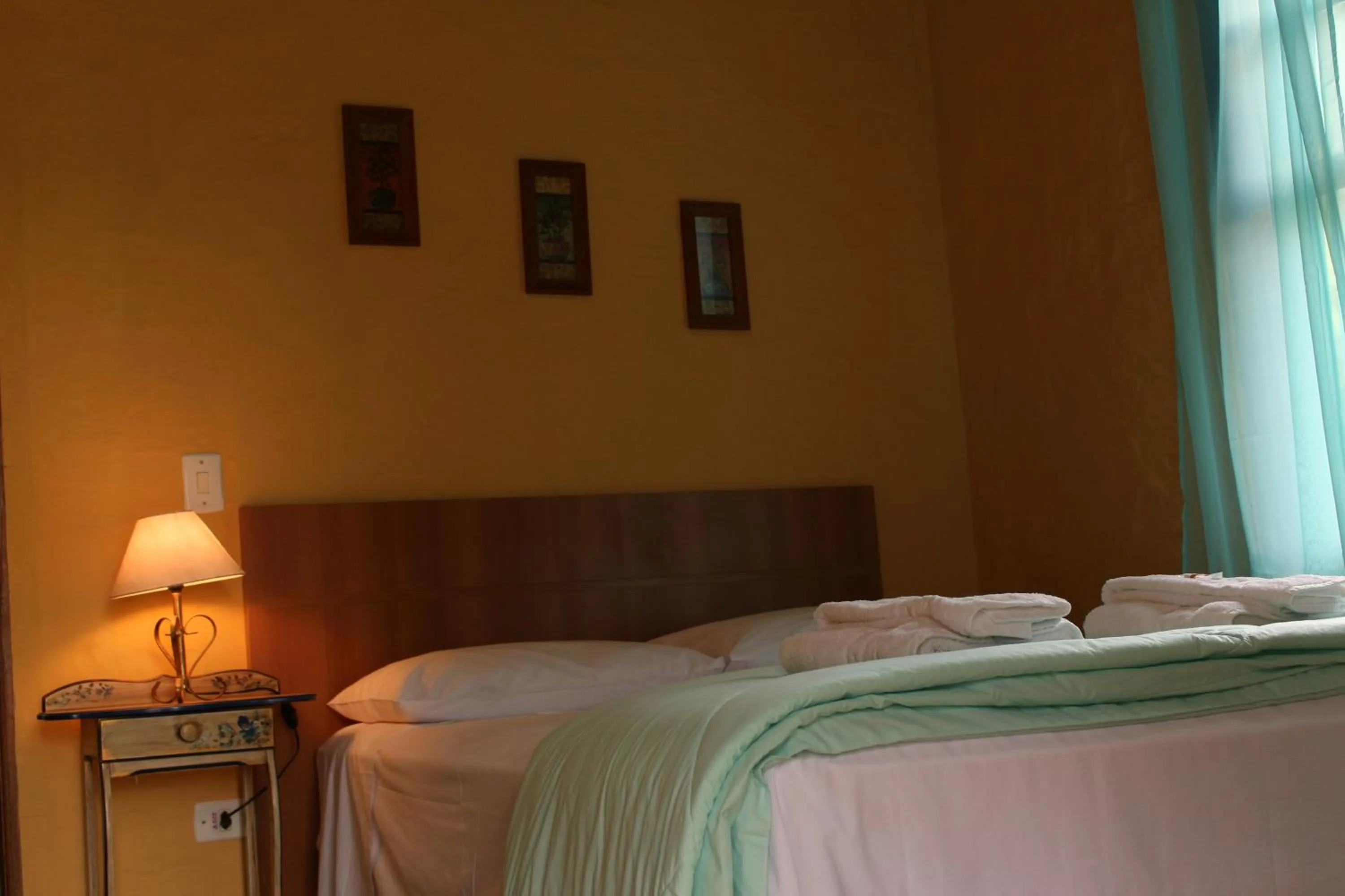 Bed in Pousada Fazenda Sant’Ana