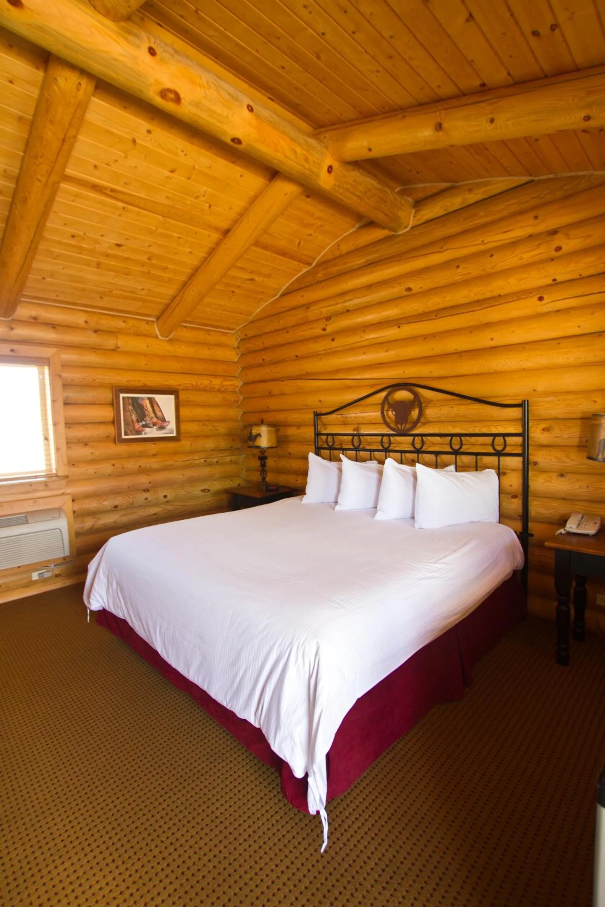 Photo of the whole room, Bed in Cody Cowboy Village