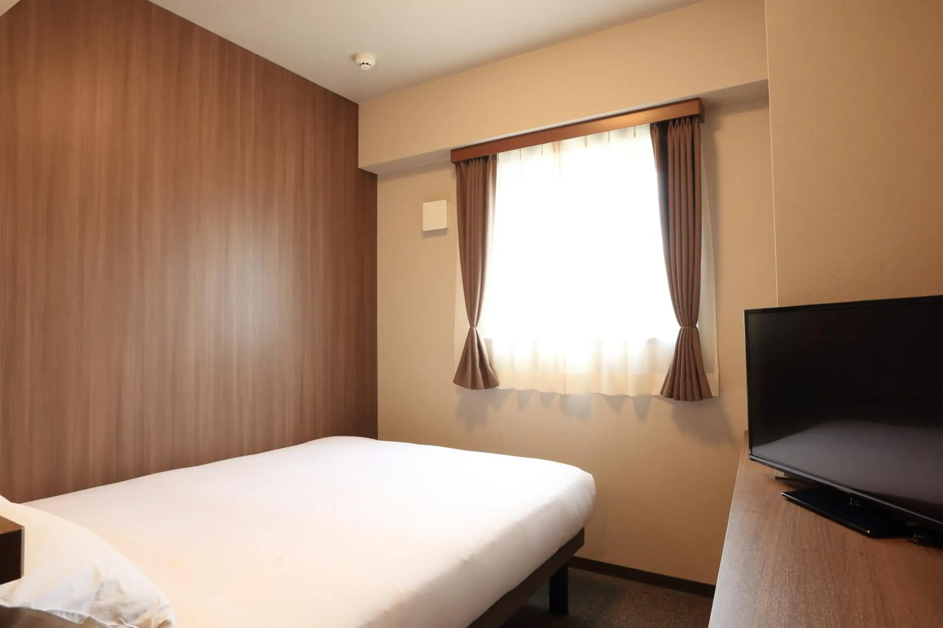 Bed in Smile Hotel Hakataekimae Bed in Smile Hotel Hakataekimae