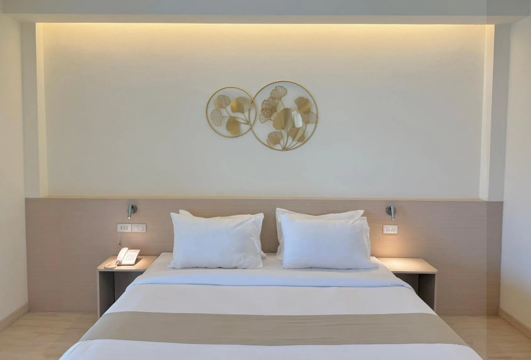 Bed in Loei Village Hotel