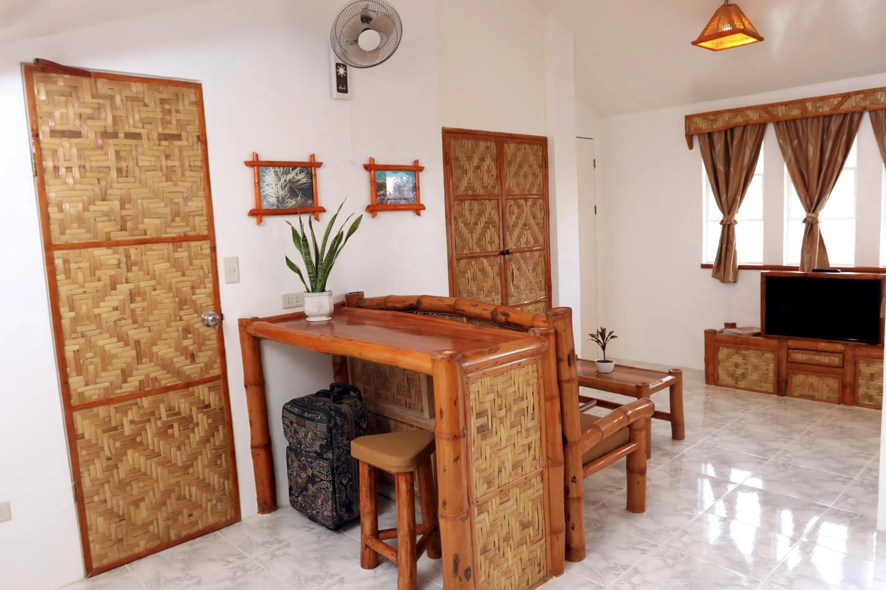 Bedroom in Guindulman Bay Tourist Inn