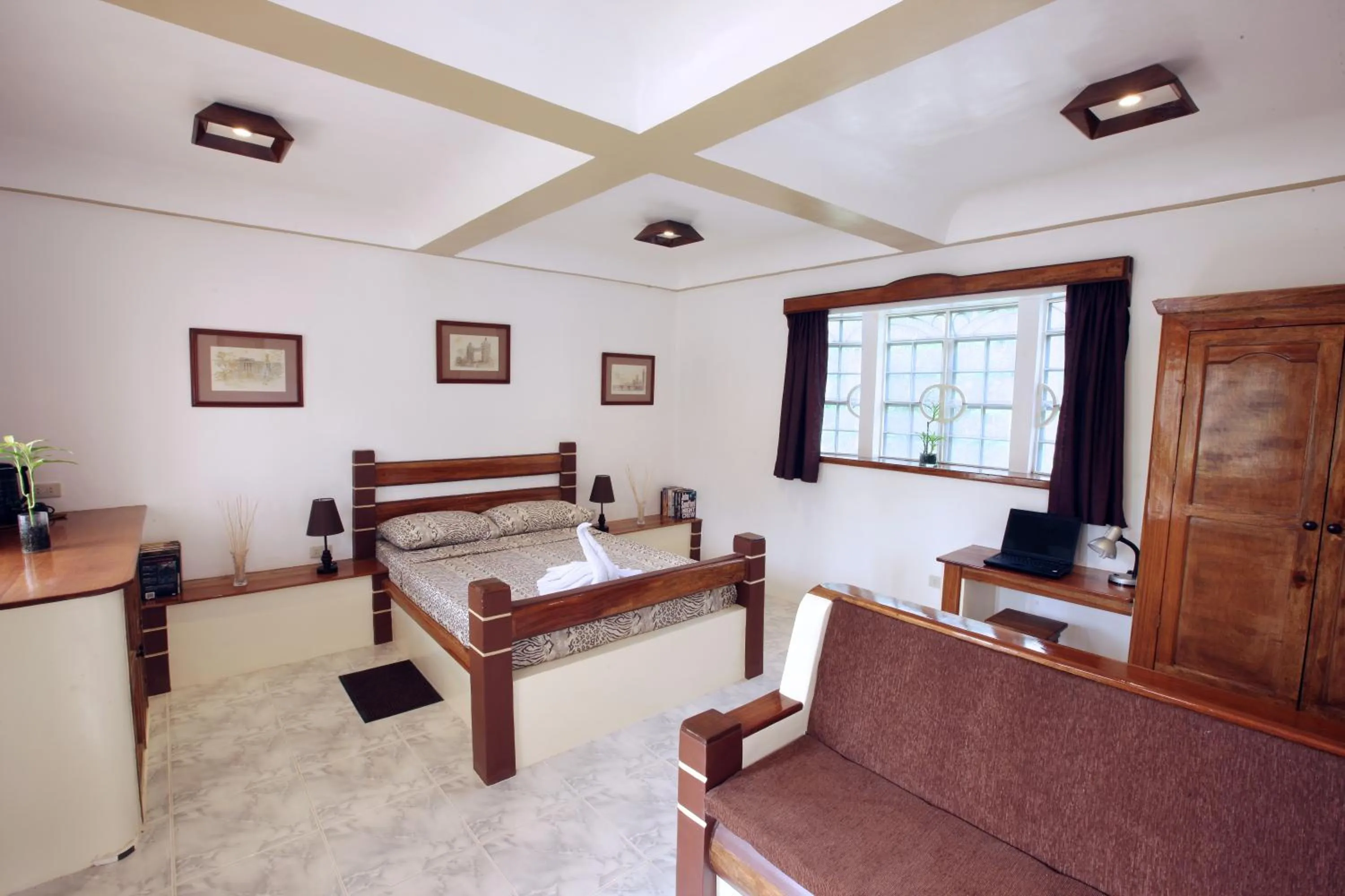 Bedroom in Guindulman Bay Tourist Inn