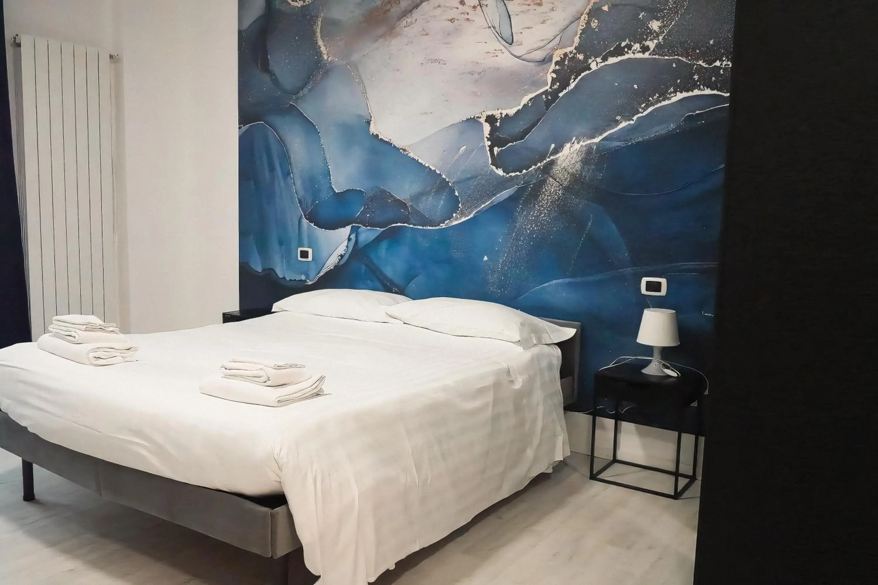 Bed in La Boheme SMART Hotel