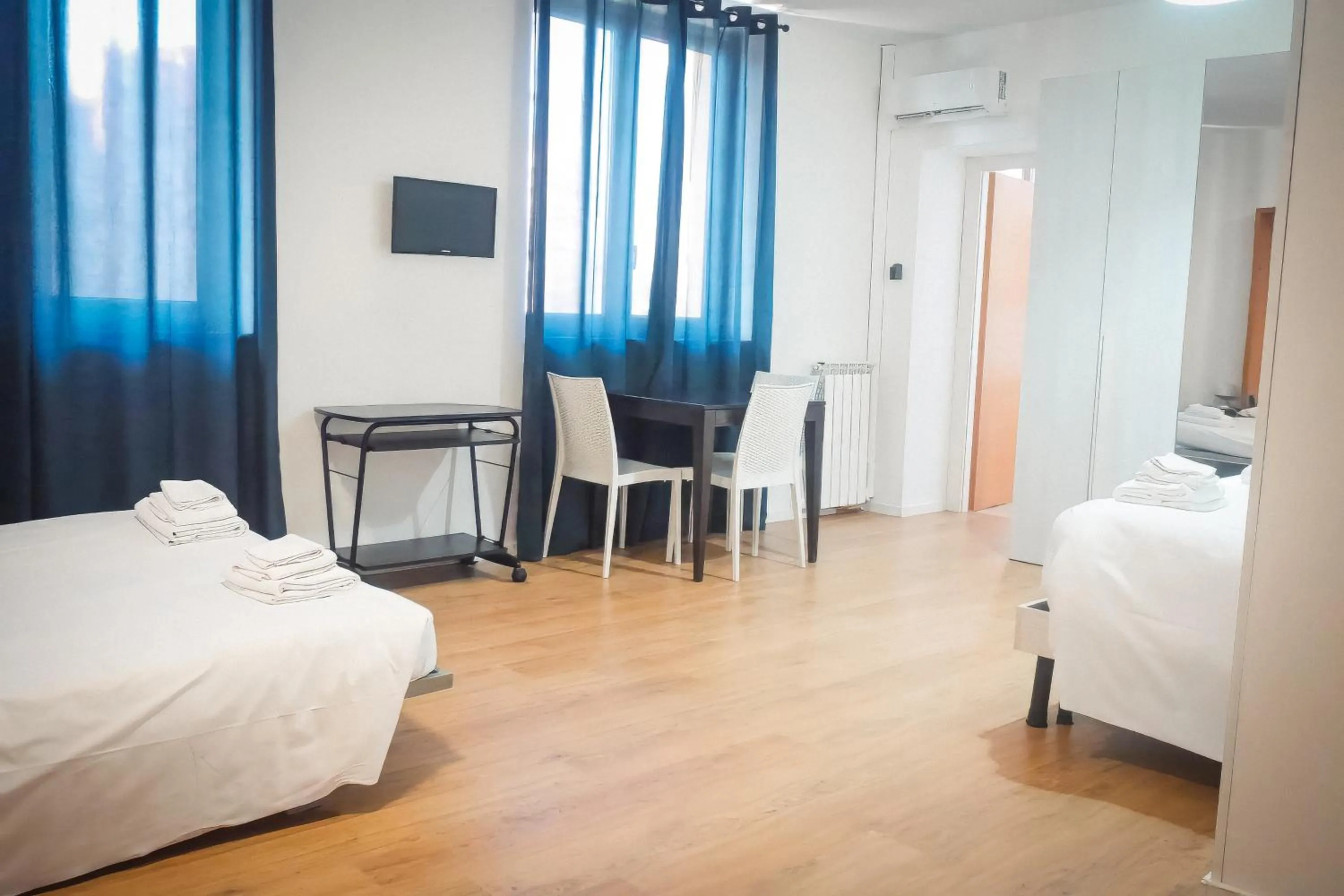 Bed in La Boheme SMART Hotel