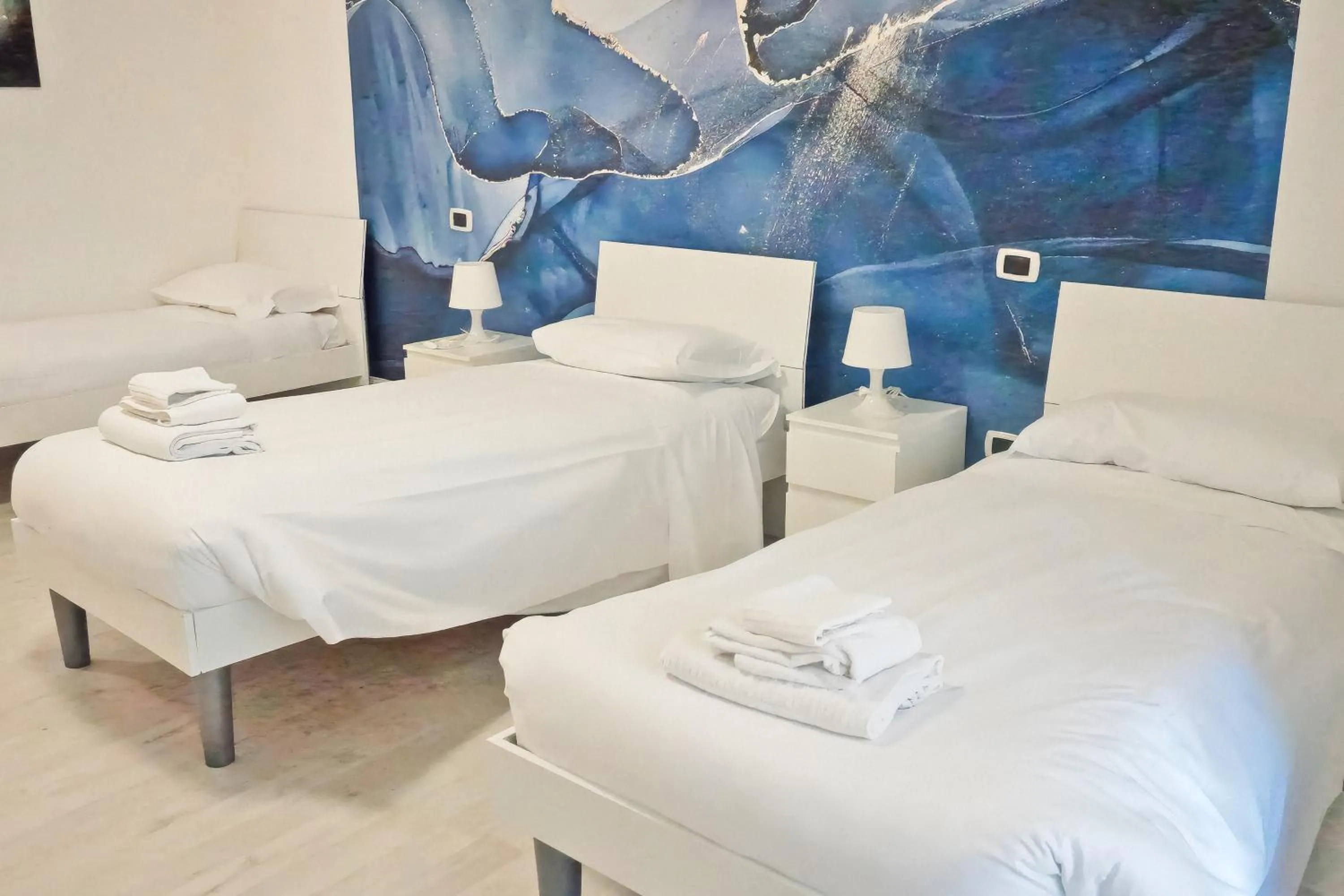 Bed in La Boheme SMART Hotel