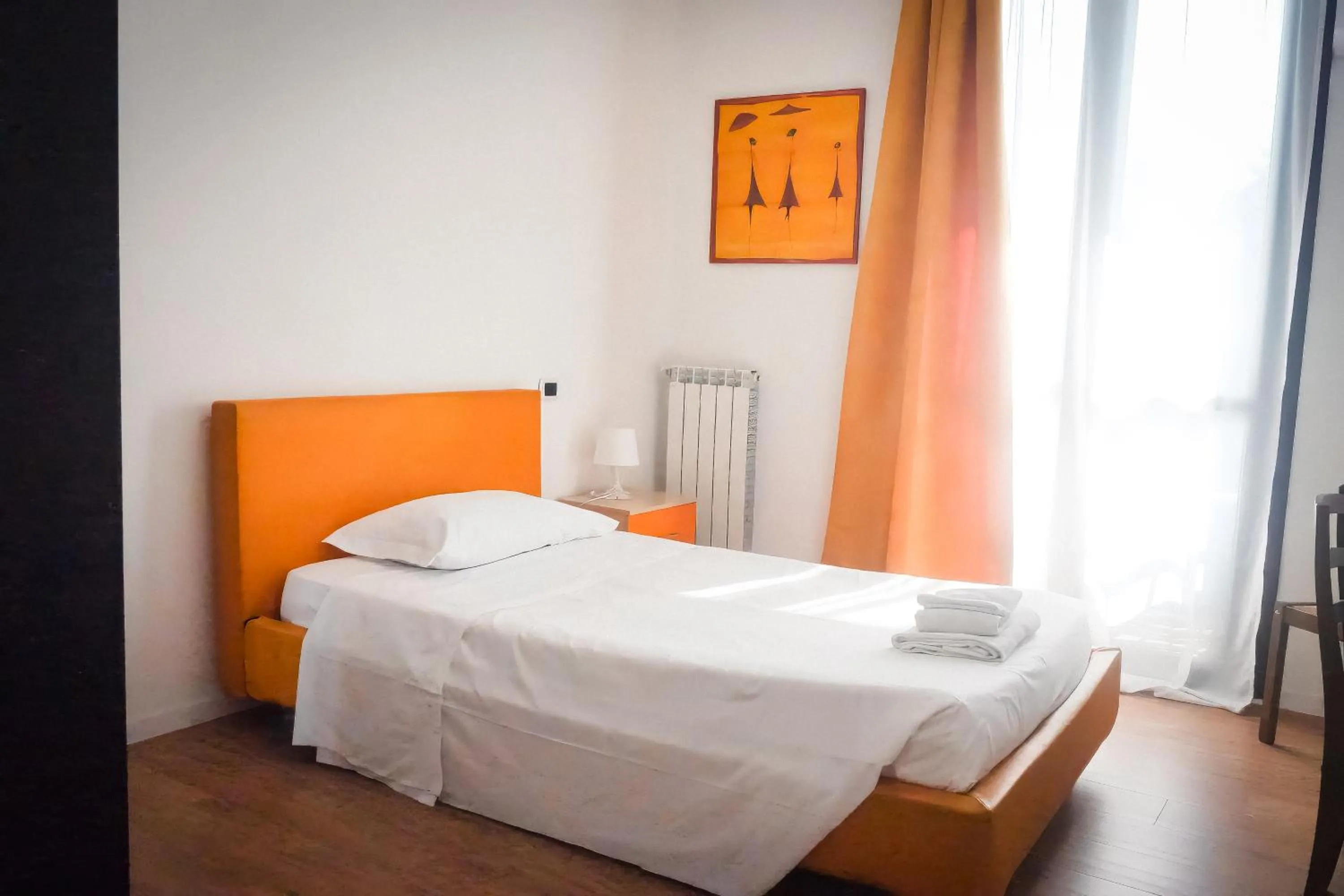 Bed in La Boheme SMART Hotel