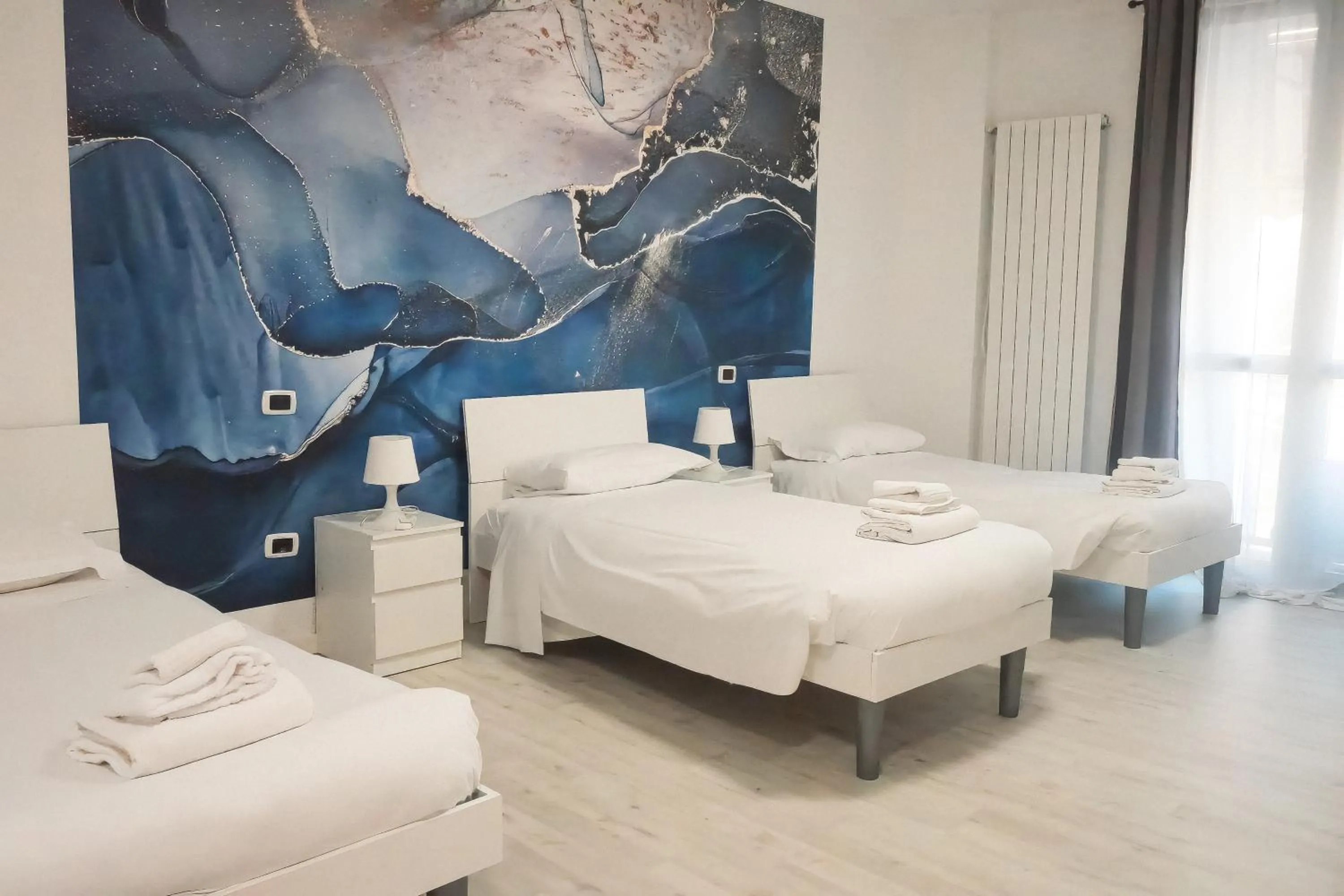 Bed in La Boheme SMART Hotel