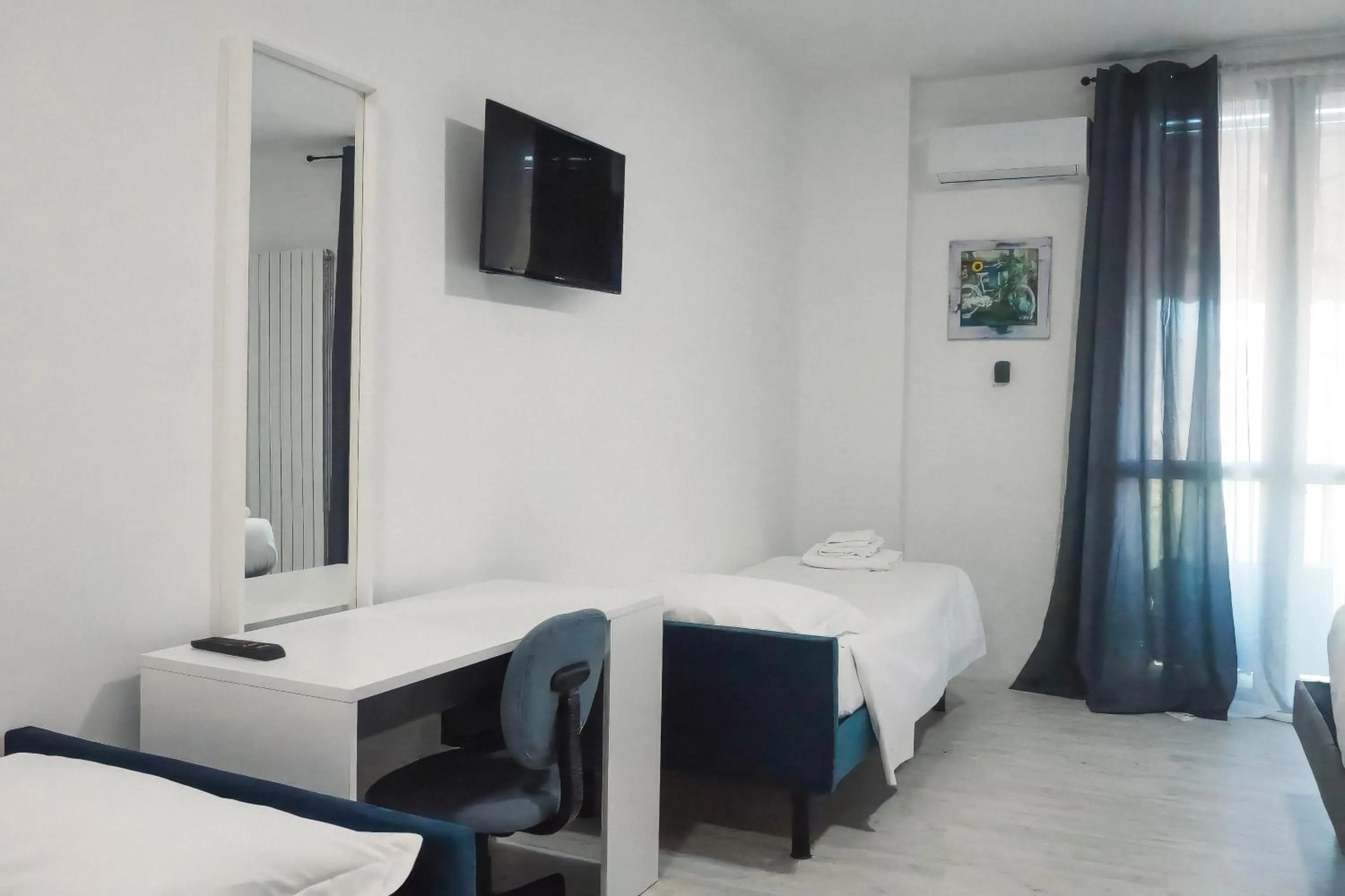 Bed in La Boheme SMART Hotel