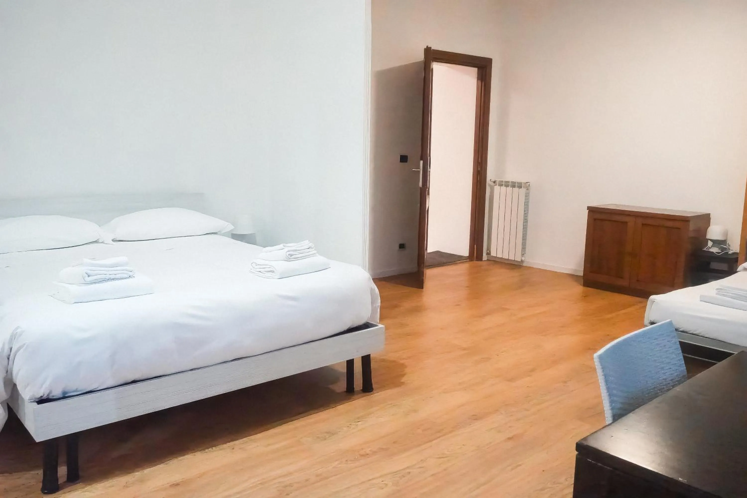 Bed in La Boheme SMART Hotel