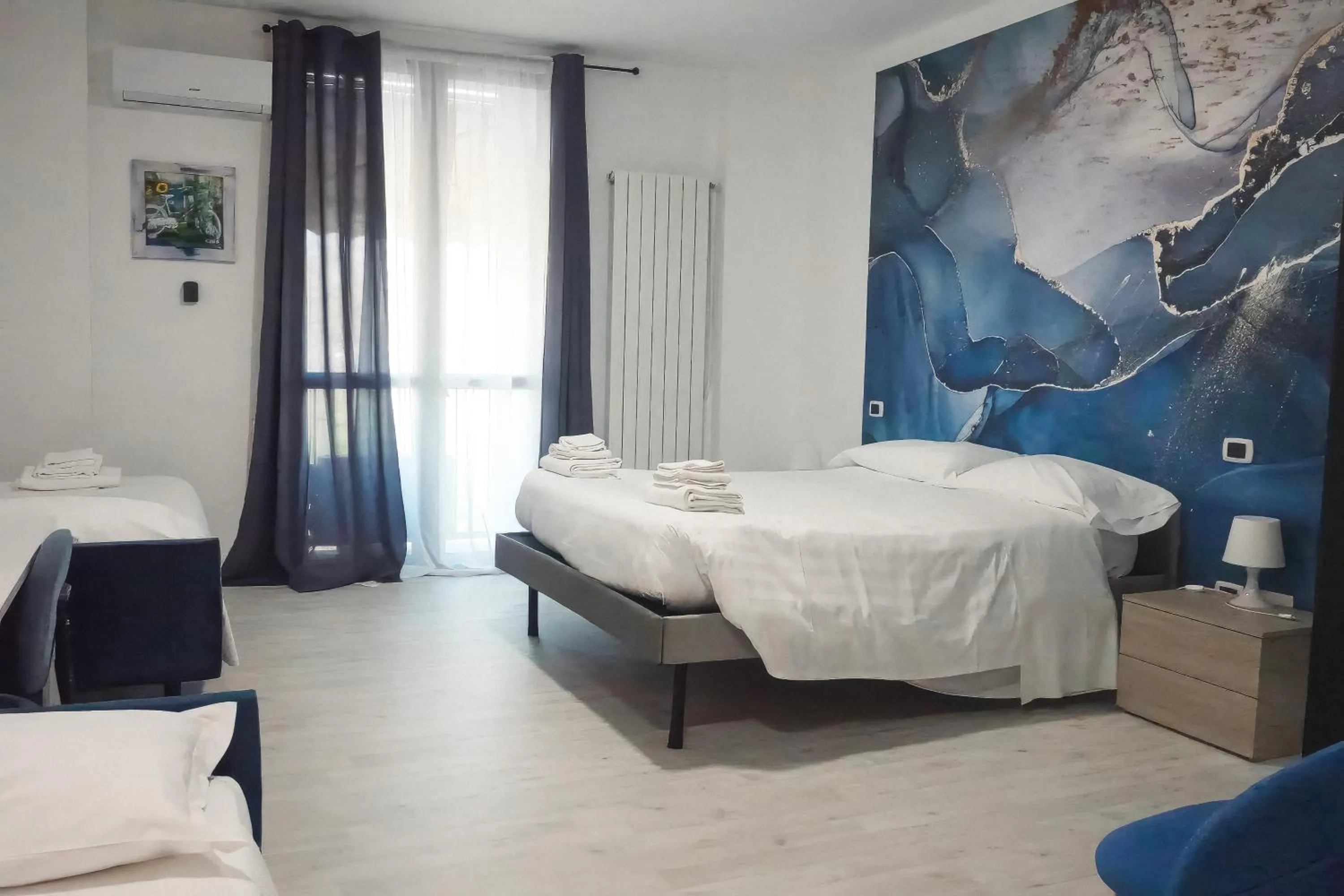 Bed in La Boheme SMART Hotel