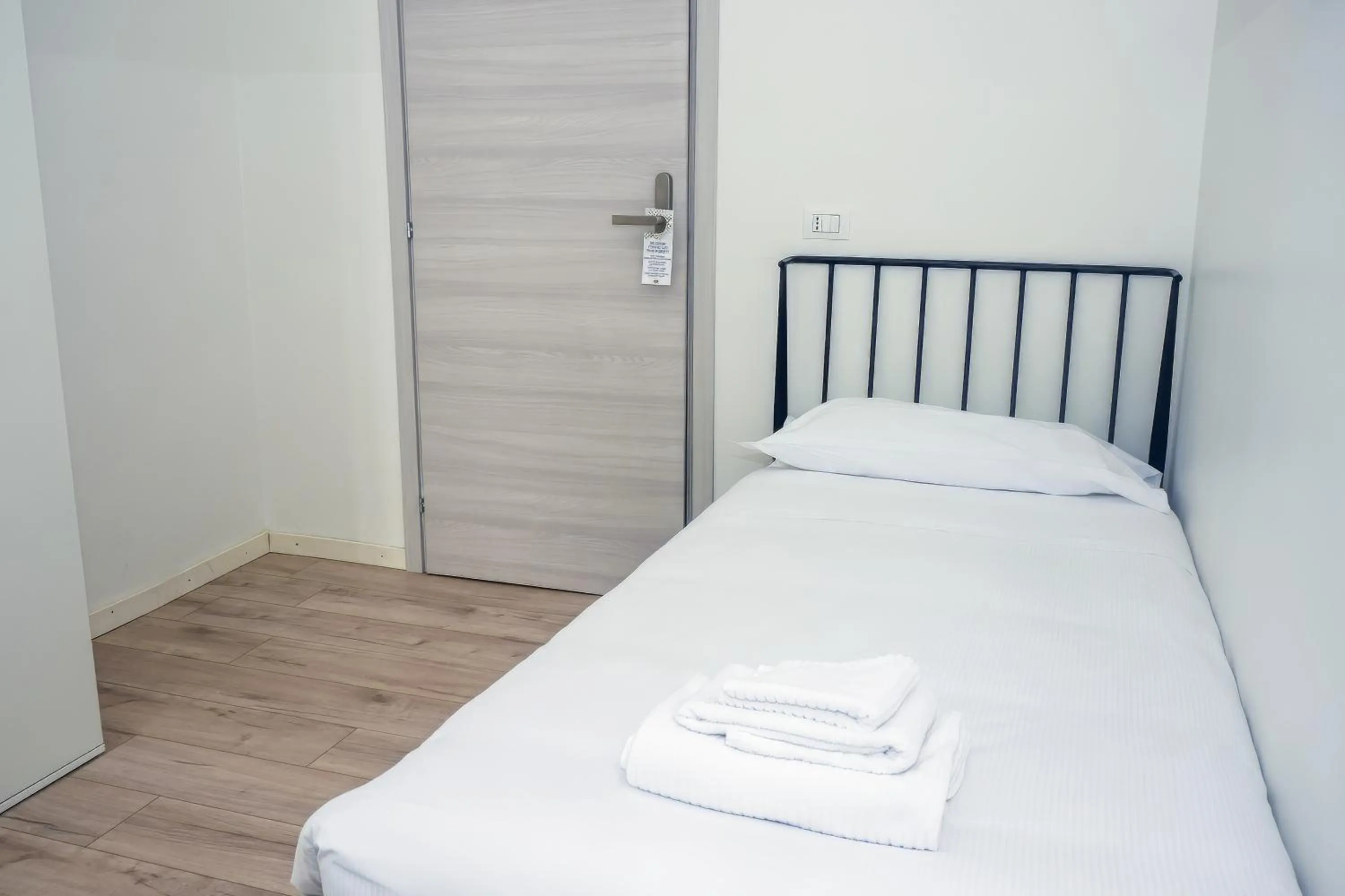 Bed in La Boheme SMART Hotel