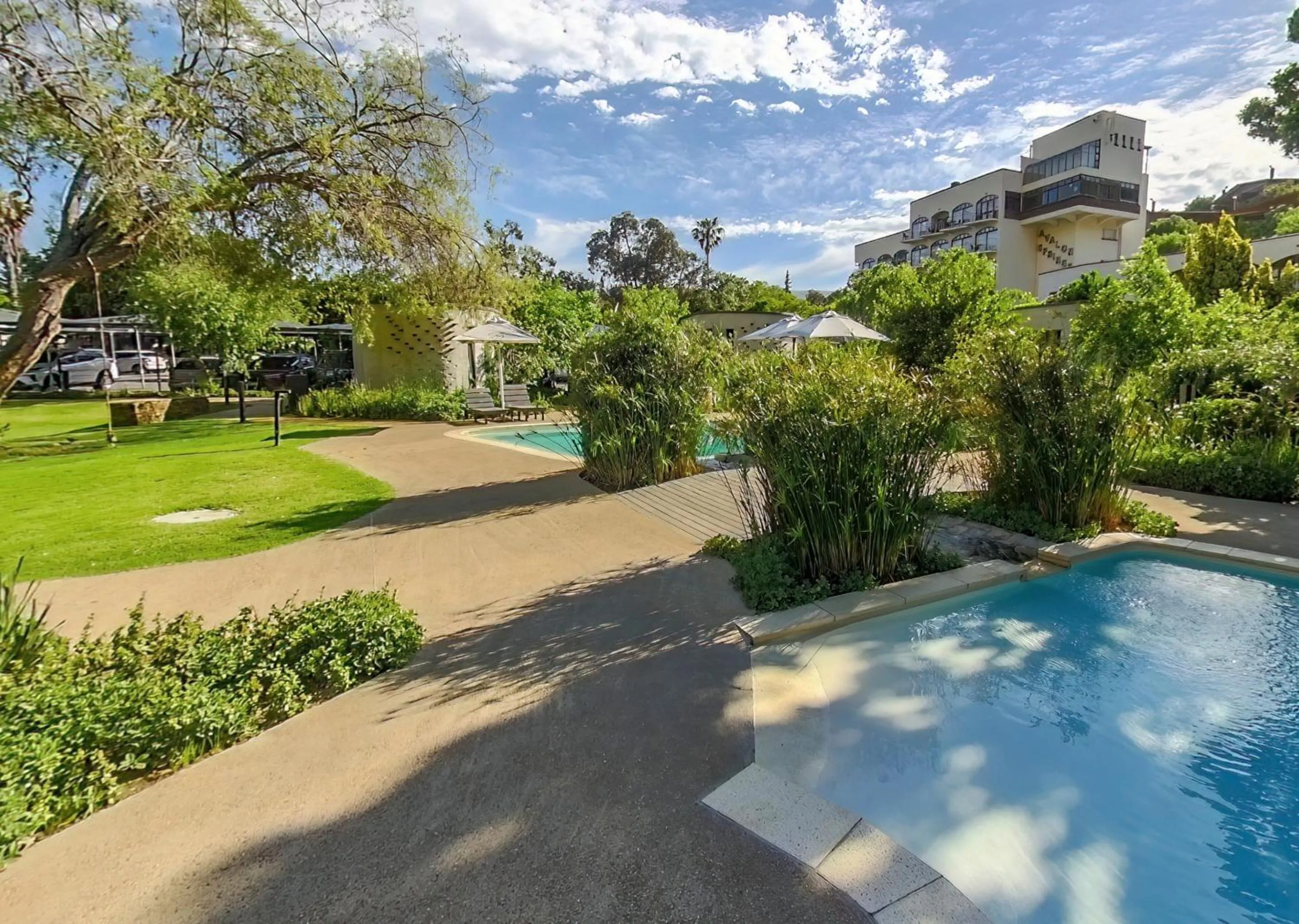 Swimming pool in Avalon Springs by Dream Resorts