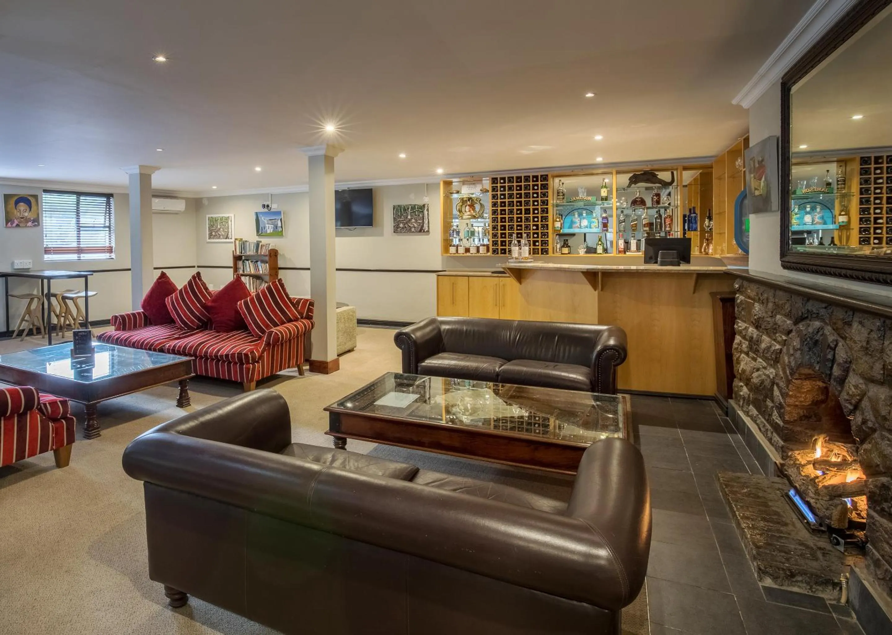 Communal lounge/ TV room in Avalon Springs by Dream Resorts