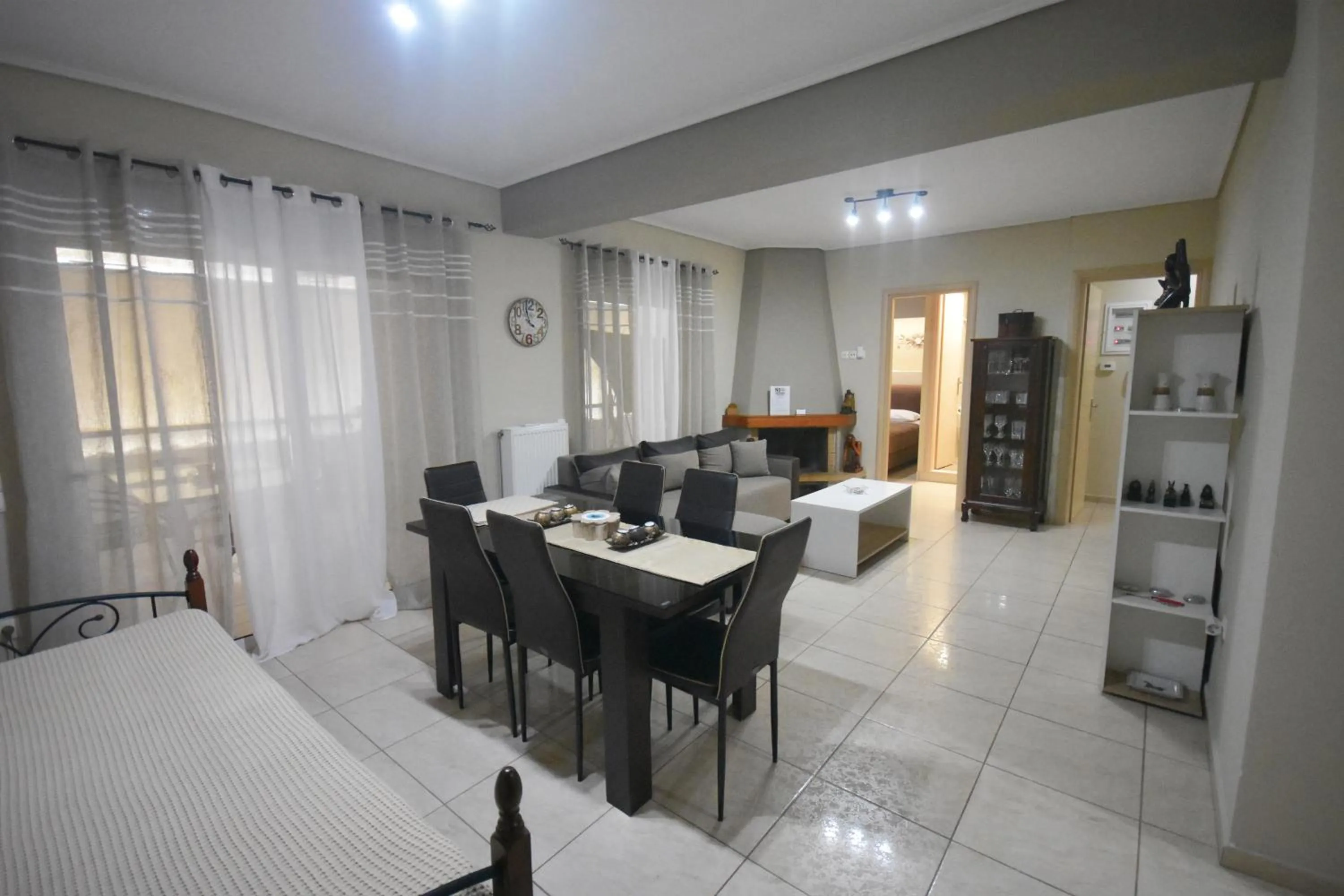 Living room, Bed in A&J Apartments or Rooms athens airport