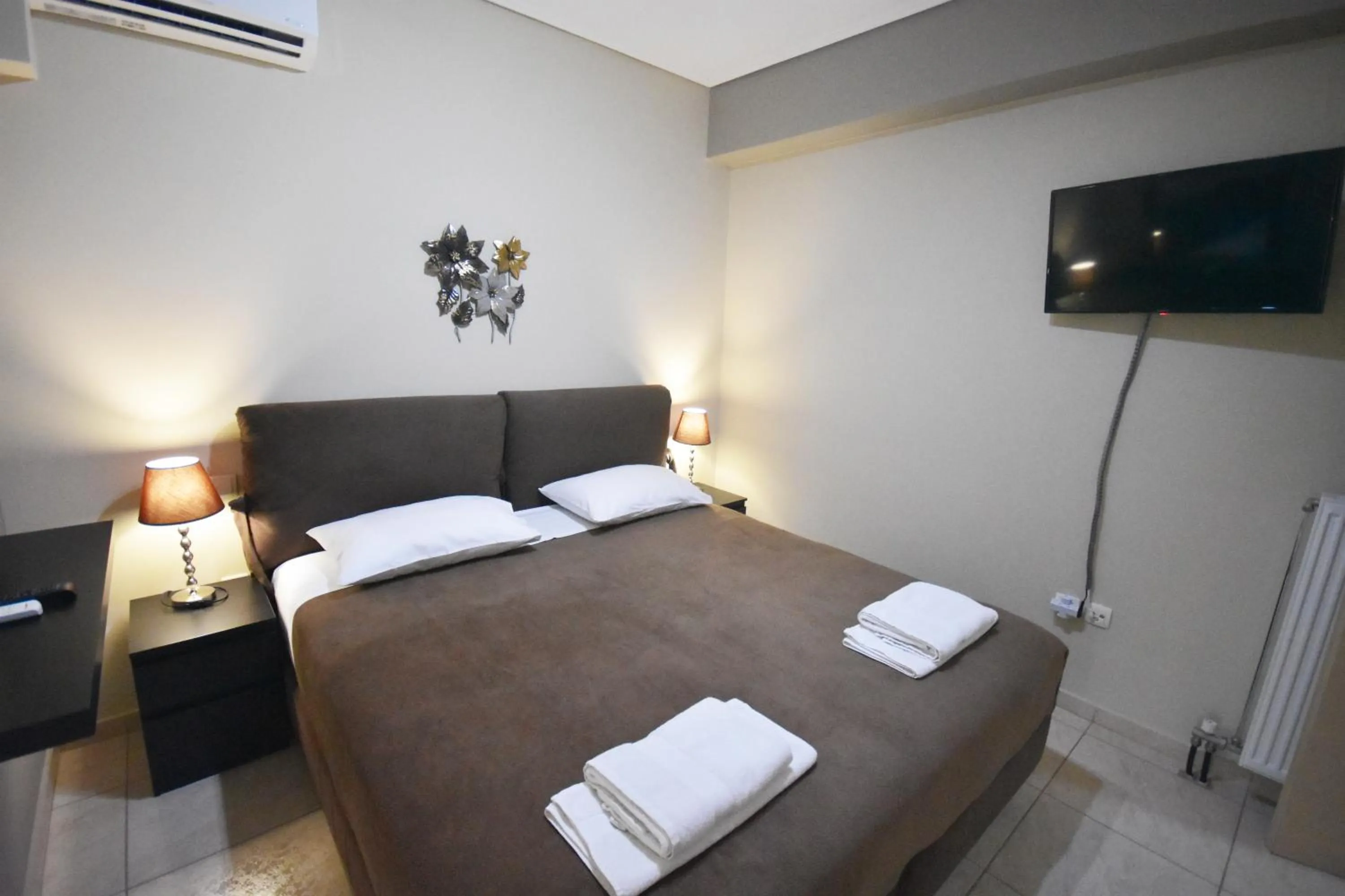 Bed in A&J Apartments or Rooms athens airport