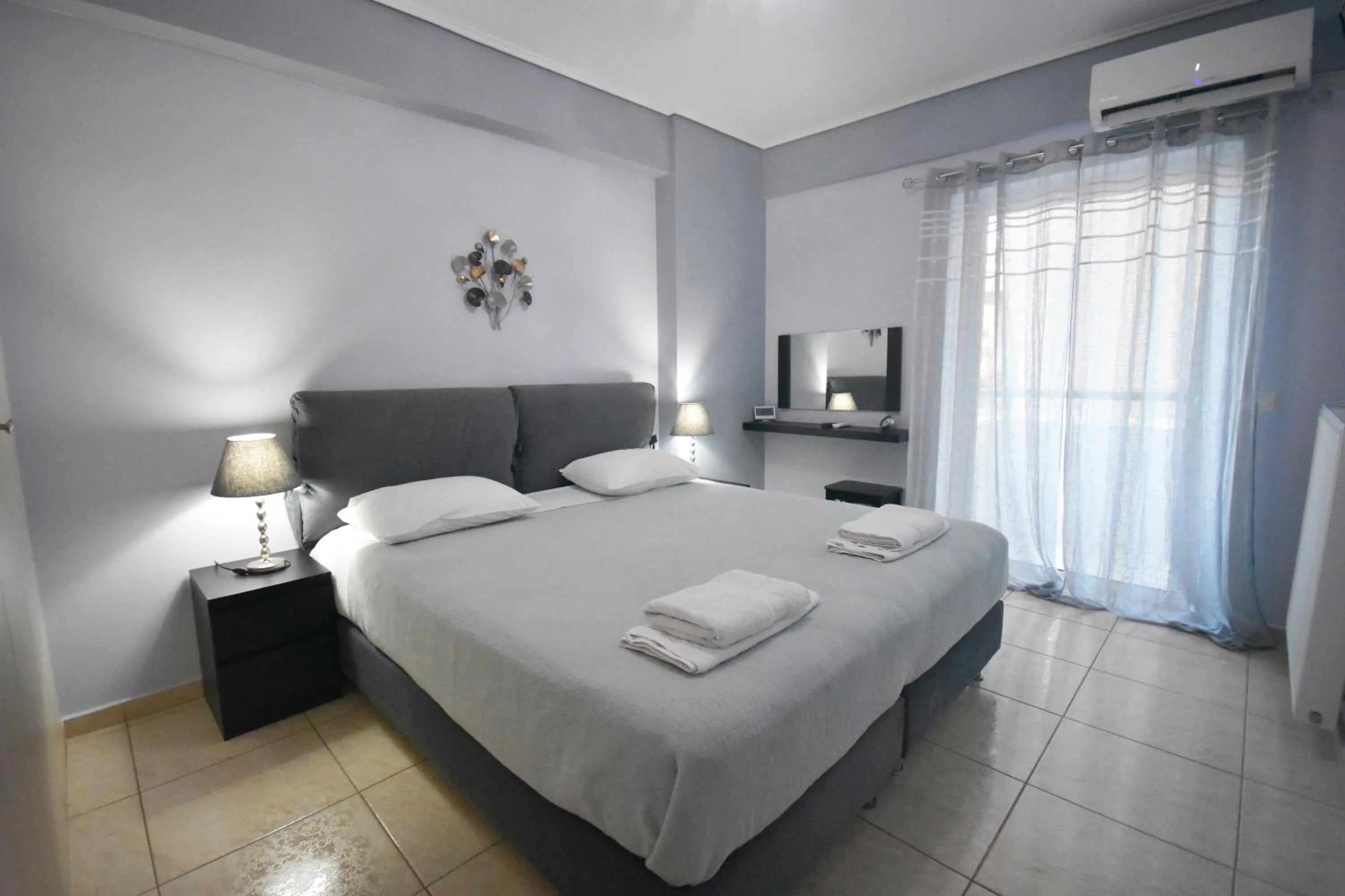 Bedroom, Bed in A&J Apartments or Rooms athens airport
