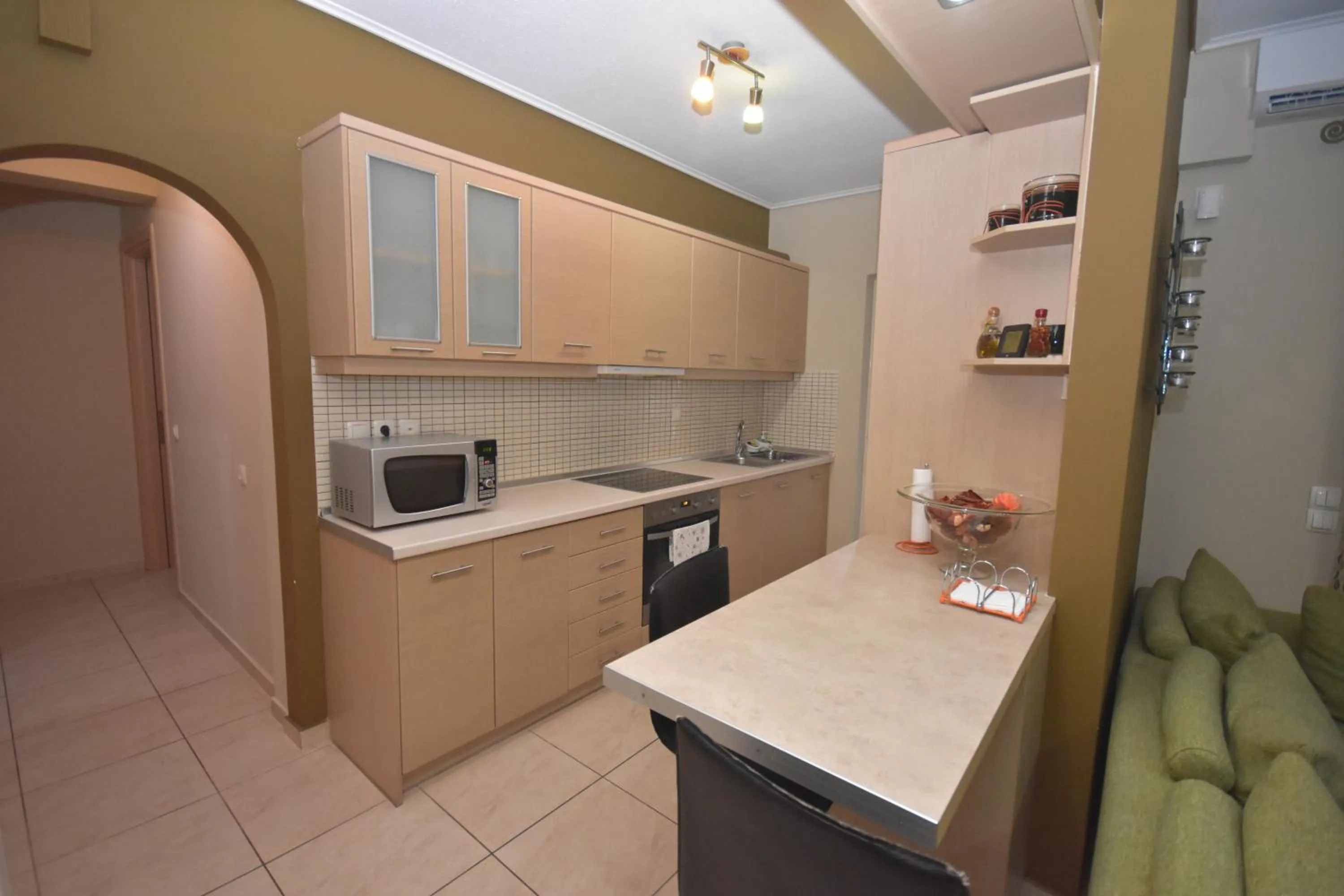 Kitchen or kitchenette in A&J Apartments or Rooms athens airport