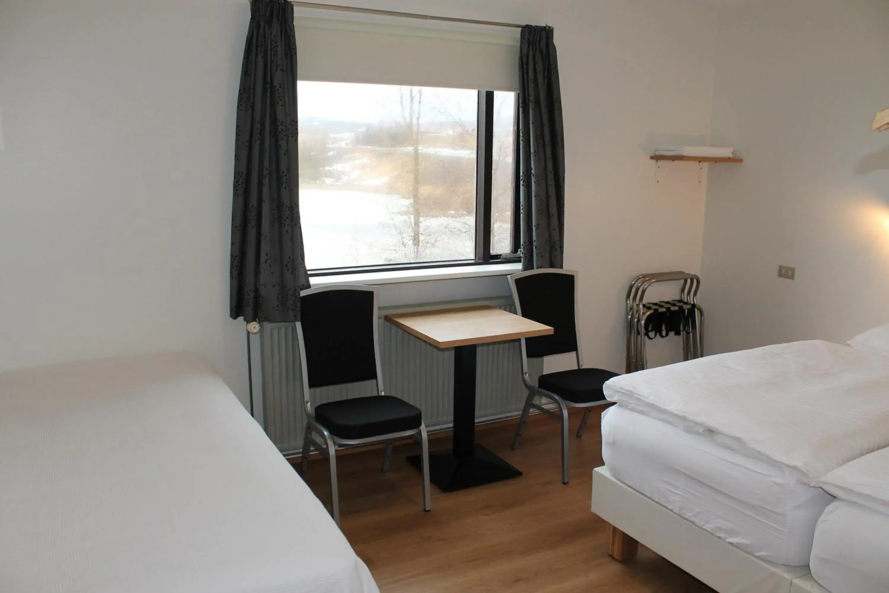 Triple Room with Shared Bathroom in Ormurinn Guesthouse Triple Room with Shared Bathroom in Ormurinn Guesthouse