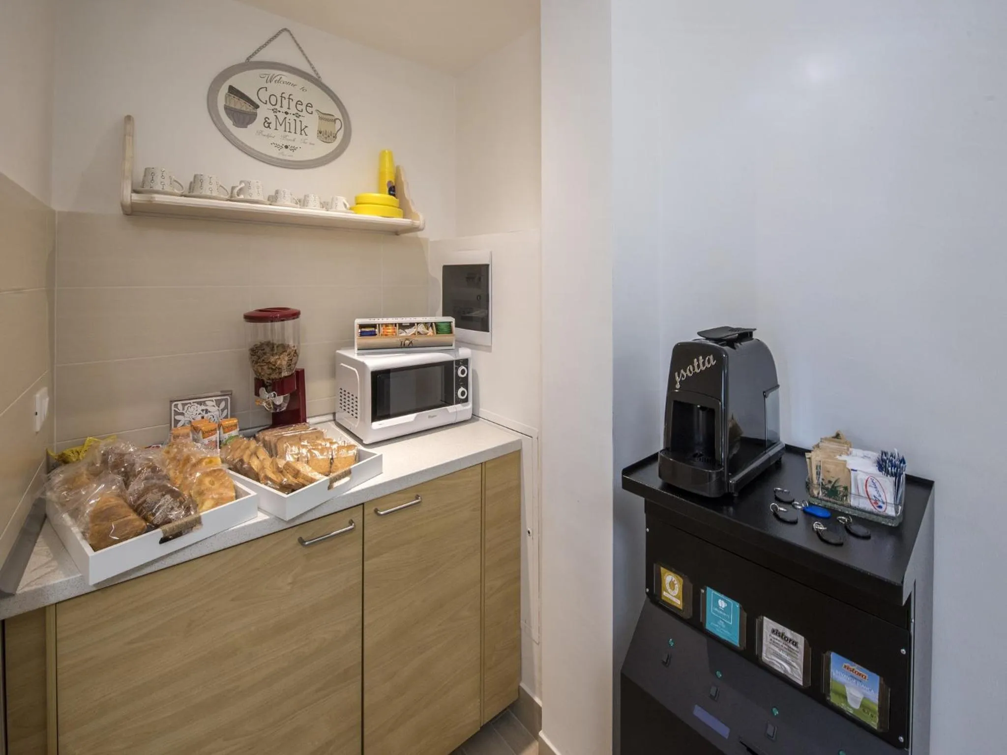 Communal lounge/ TV room in Affittacamere Le Quattro Stagioni