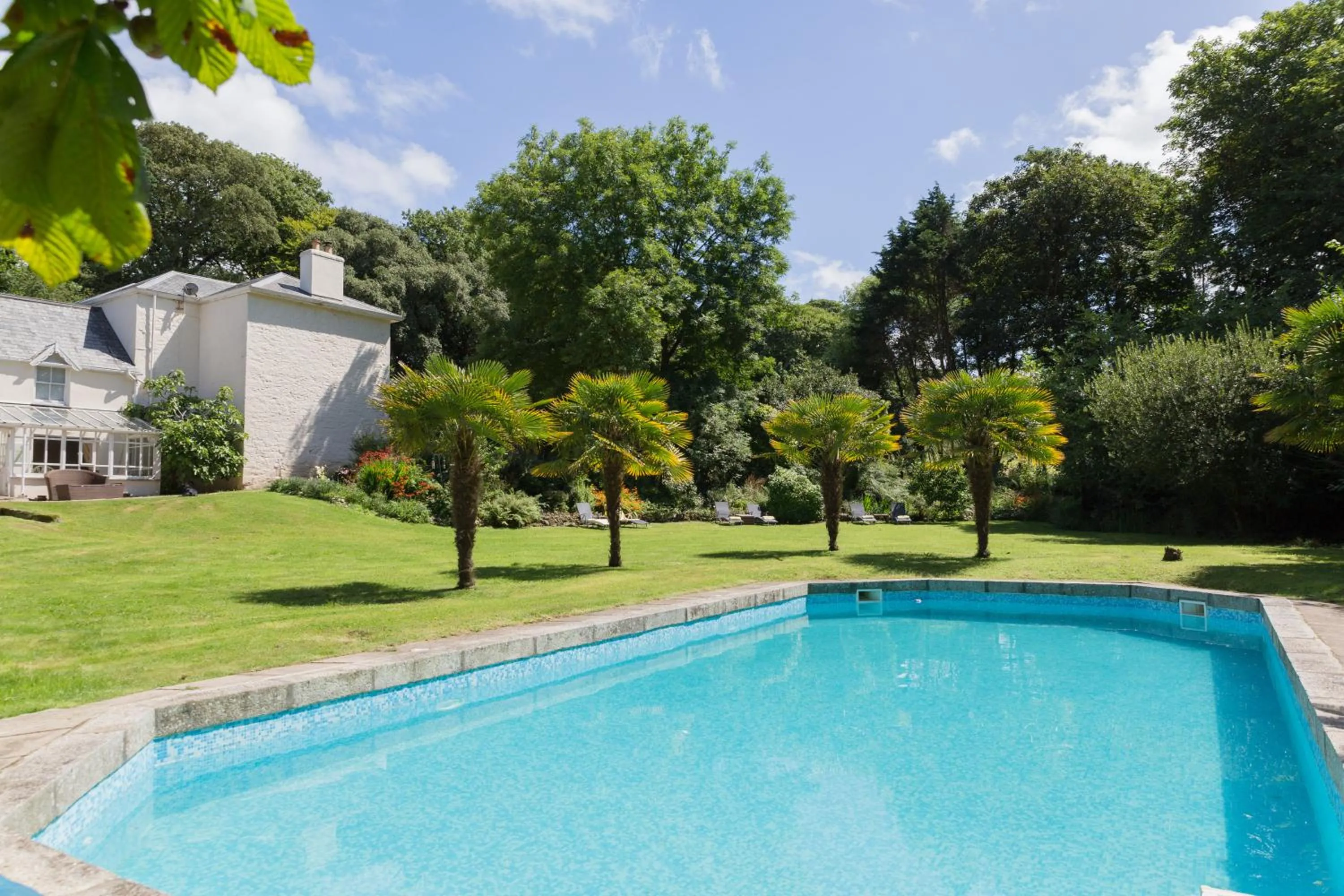 Property building in Red River Stables - Peaceful, beautiful grounds, swimming pool, central location for West Cornwall