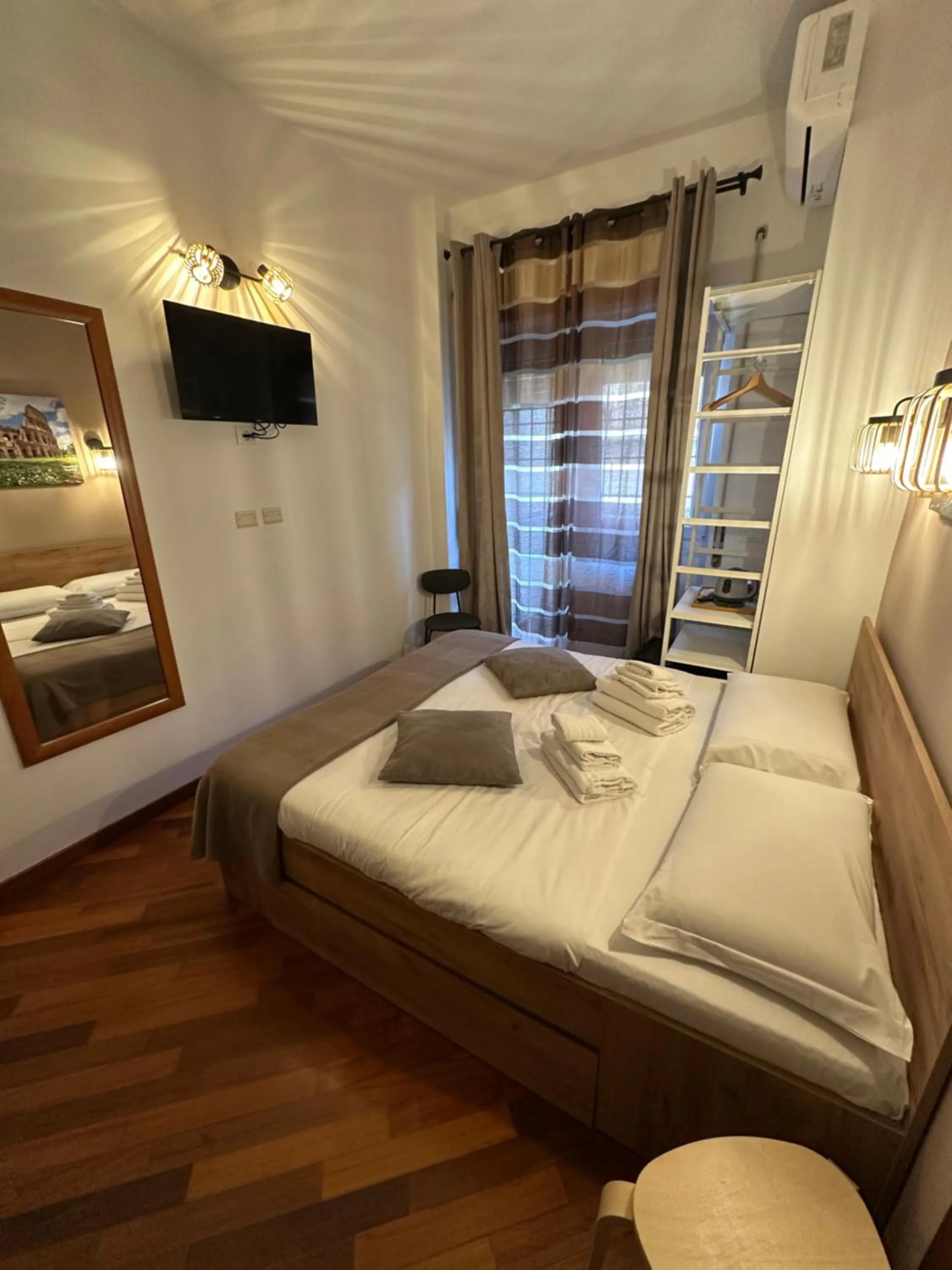 Bed in Vatican QG Rooms