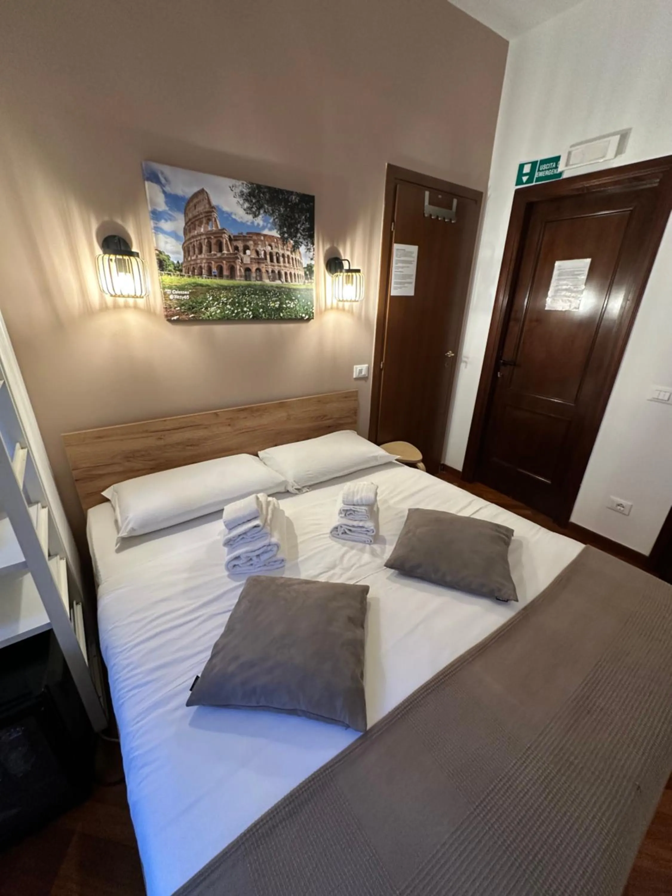 Bed in Vatican QG Rooms