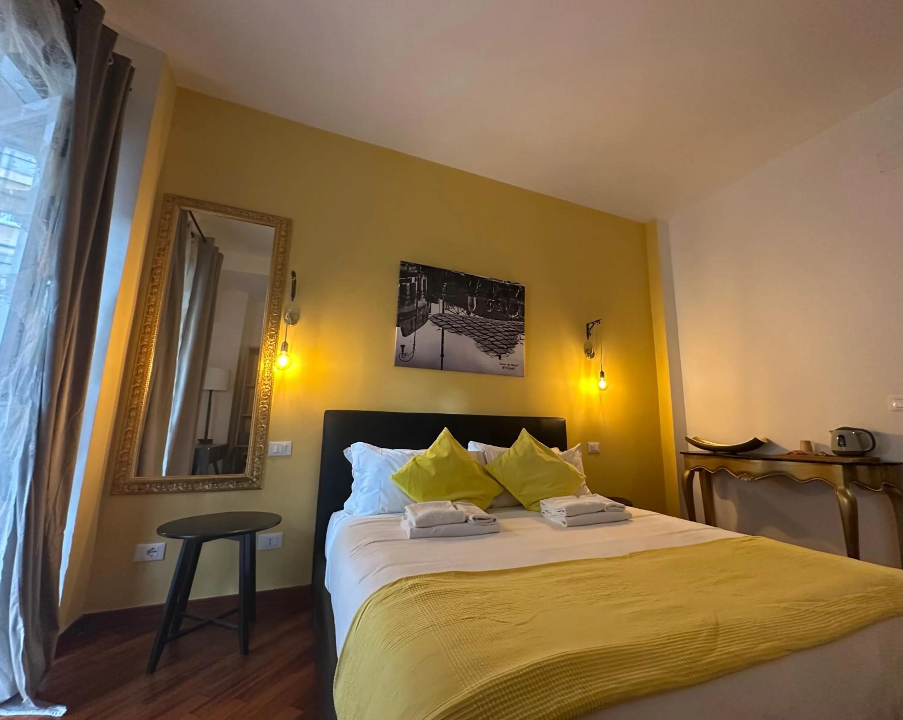 Bed in Vatican QG Rooms