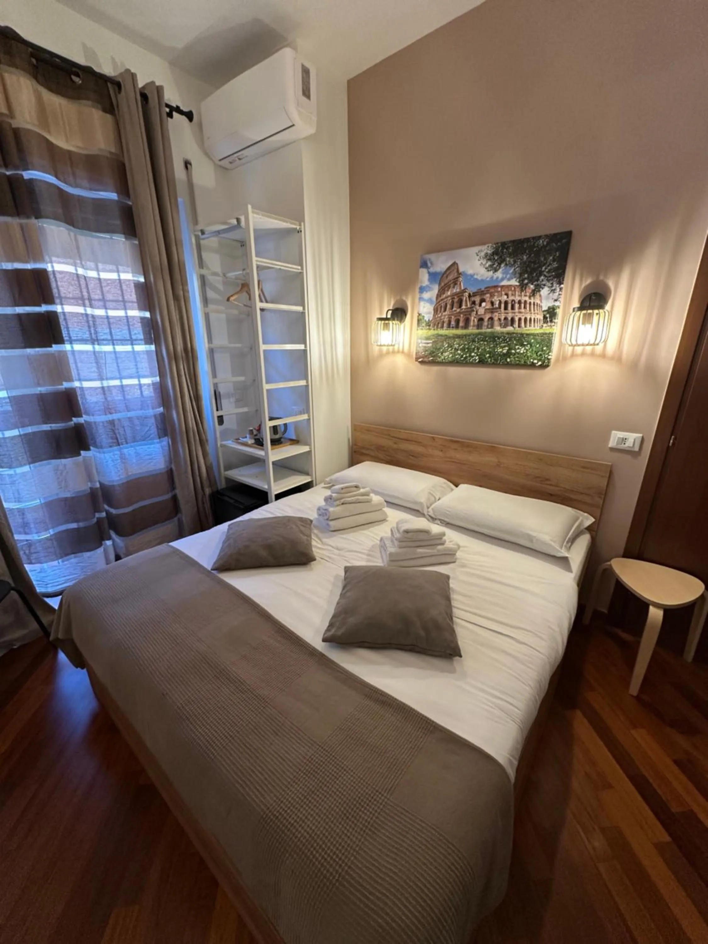 Bed in Vatican QG Rooms