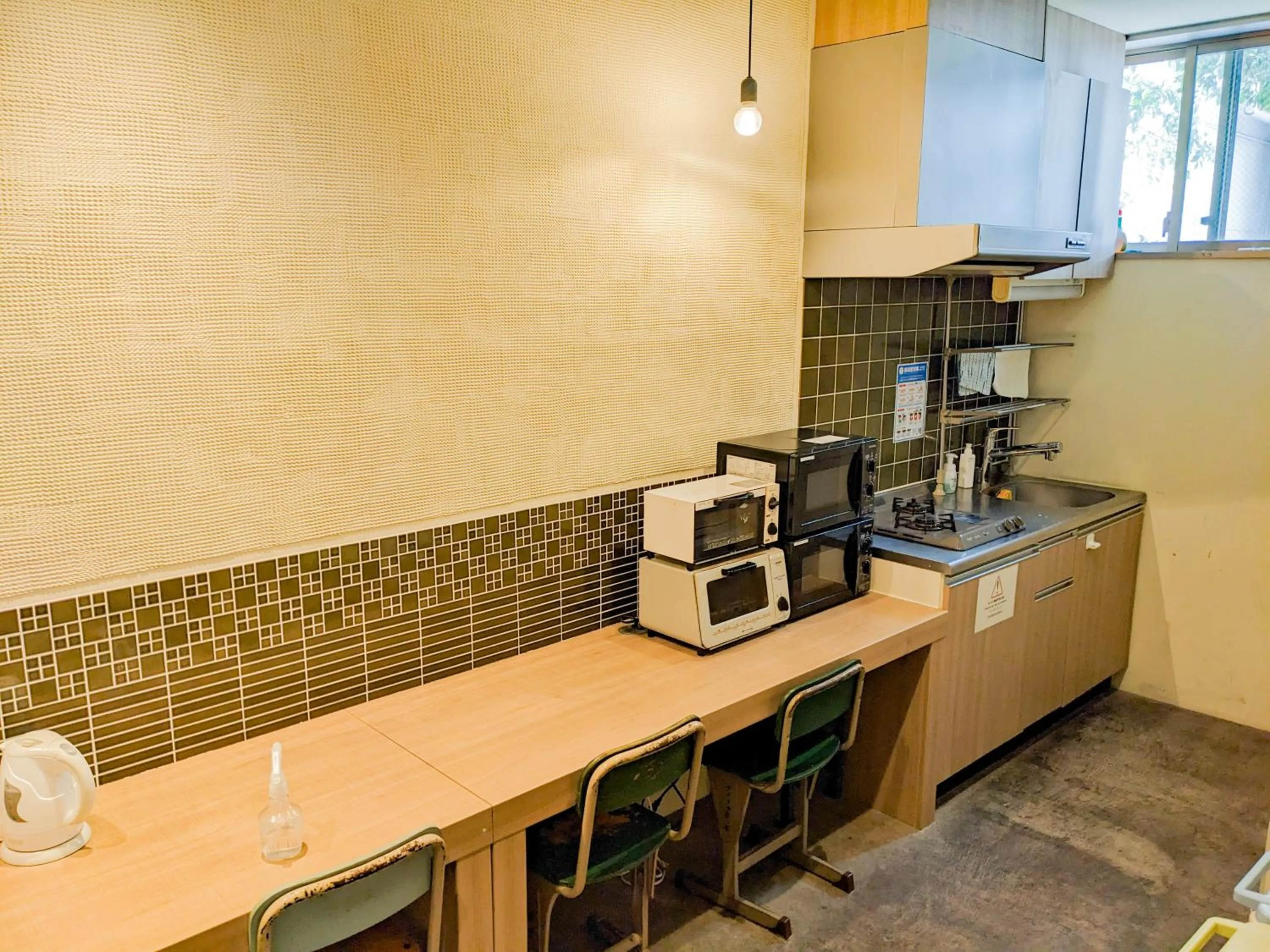 Kitchen or kitchenette in Hostel JIN