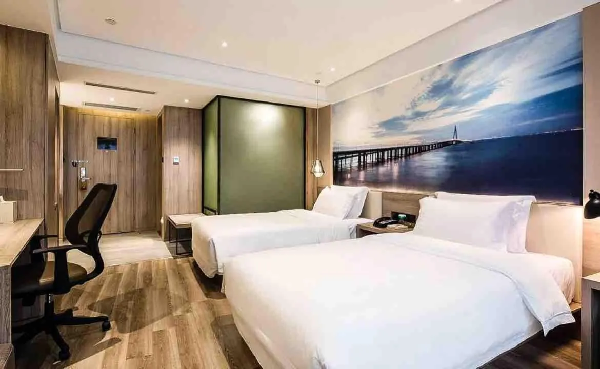 Bed in Ningbo Tianyi Square Atour Hotel