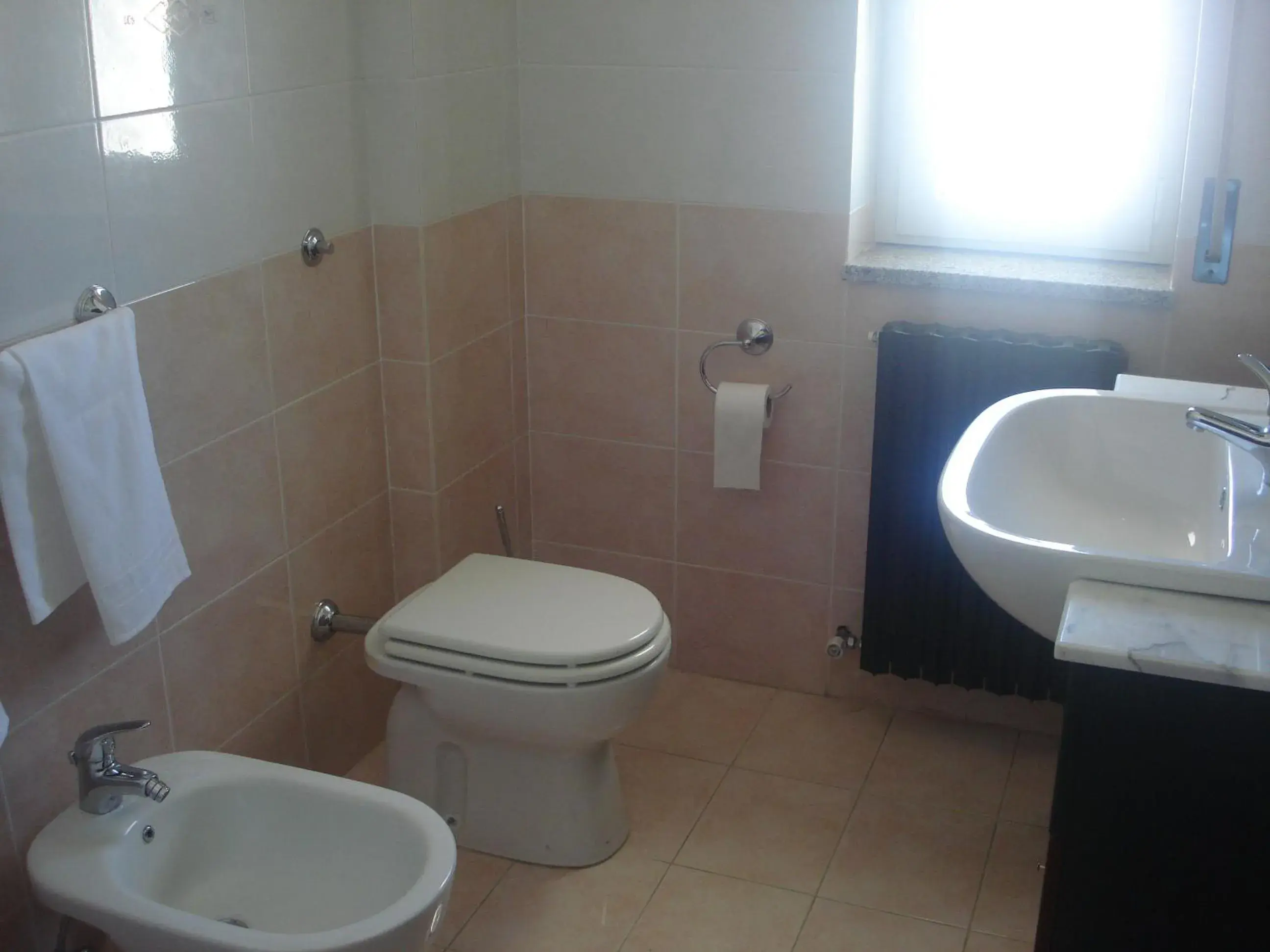 Quadruple Room in Hotel Grandinetti Quadruple Room in Hotel Grandinetti