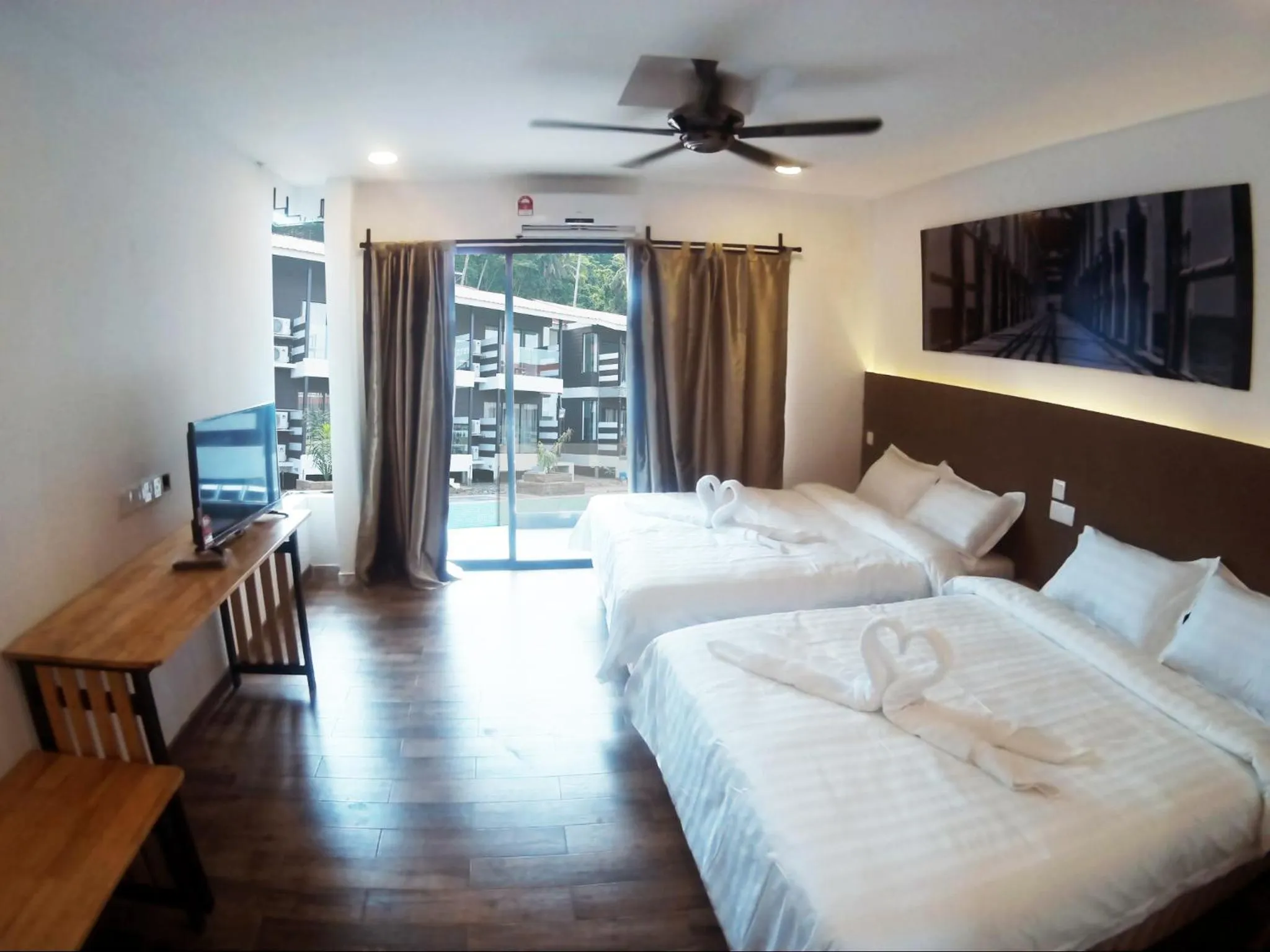 Photo of the whole room, Bed in The Barat Tioman Beach Resort