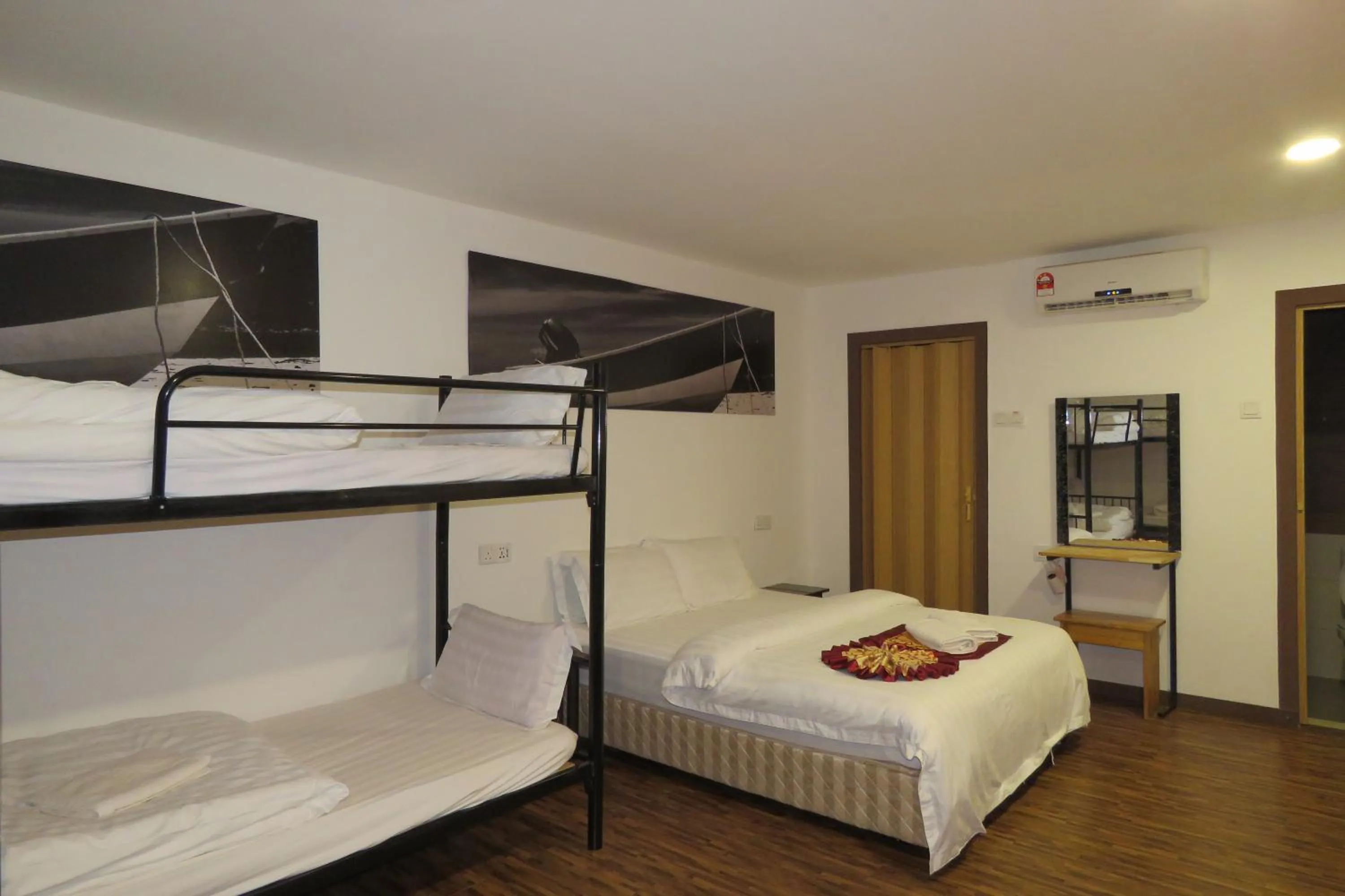 Bed in The Barat Tioman Beach Resort