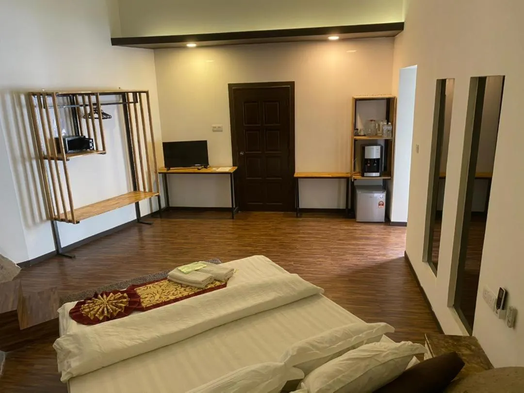 Bed in The Barat Tioman Beach Resort