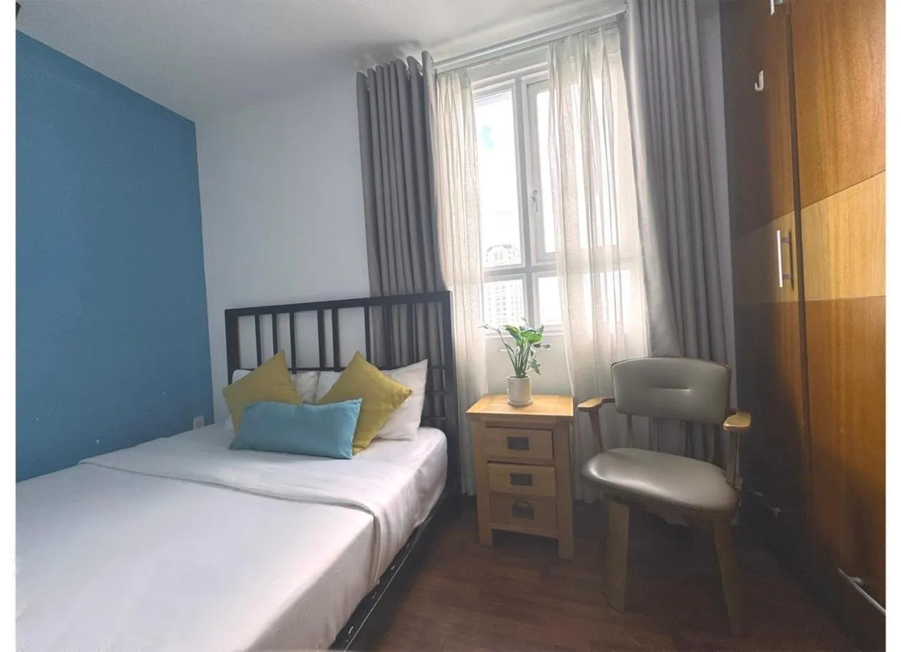 Bed in Chillax Apartment - Cozy 3-Bedroom City View Home at Tower, District 1