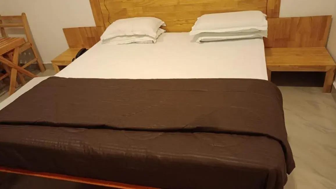 Bed in Coconhuts Beach Resort Bed in Coconhuts Beach Resort