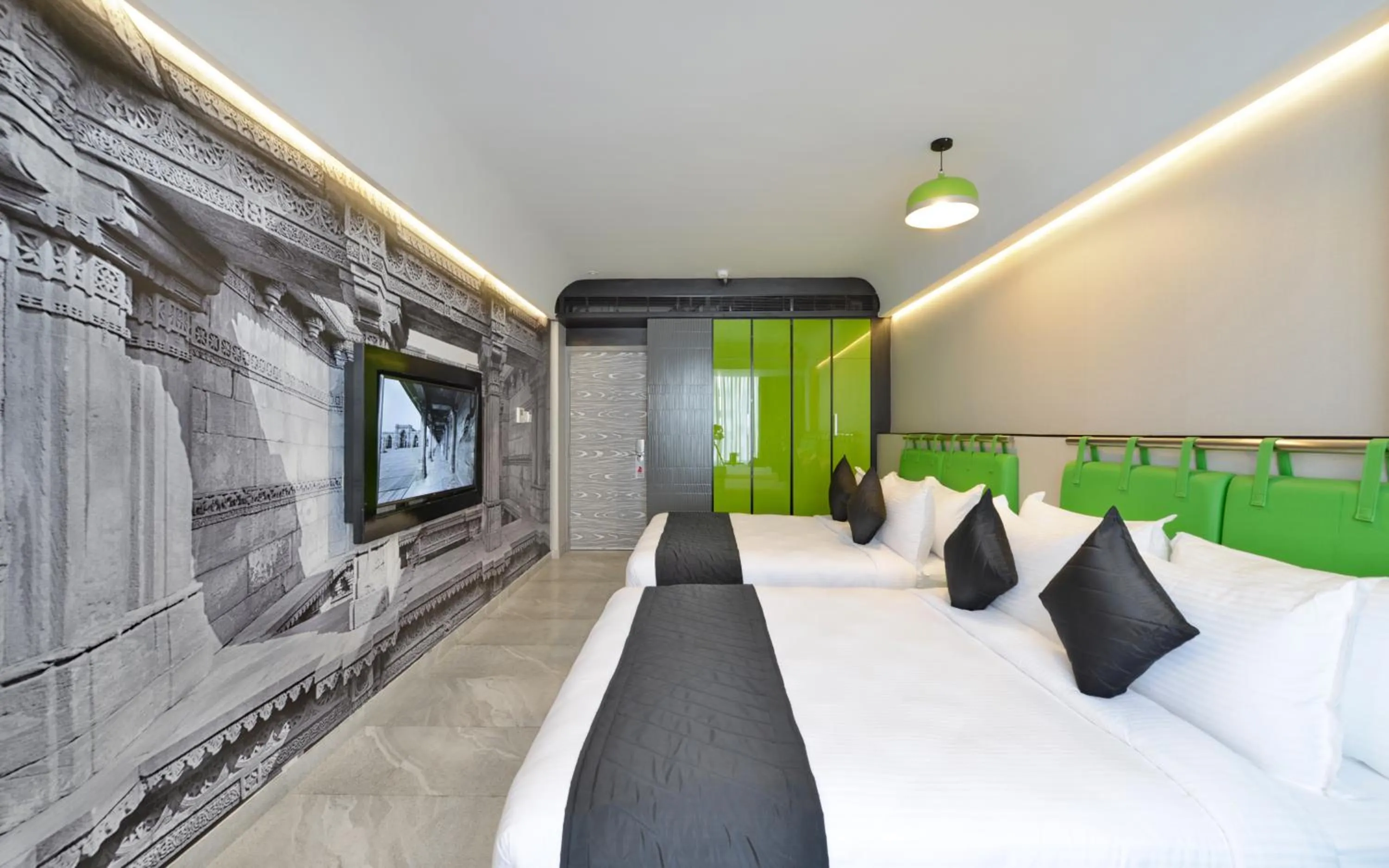 Bedroom, Bed in Regenta Central Antarim Ahmedabad