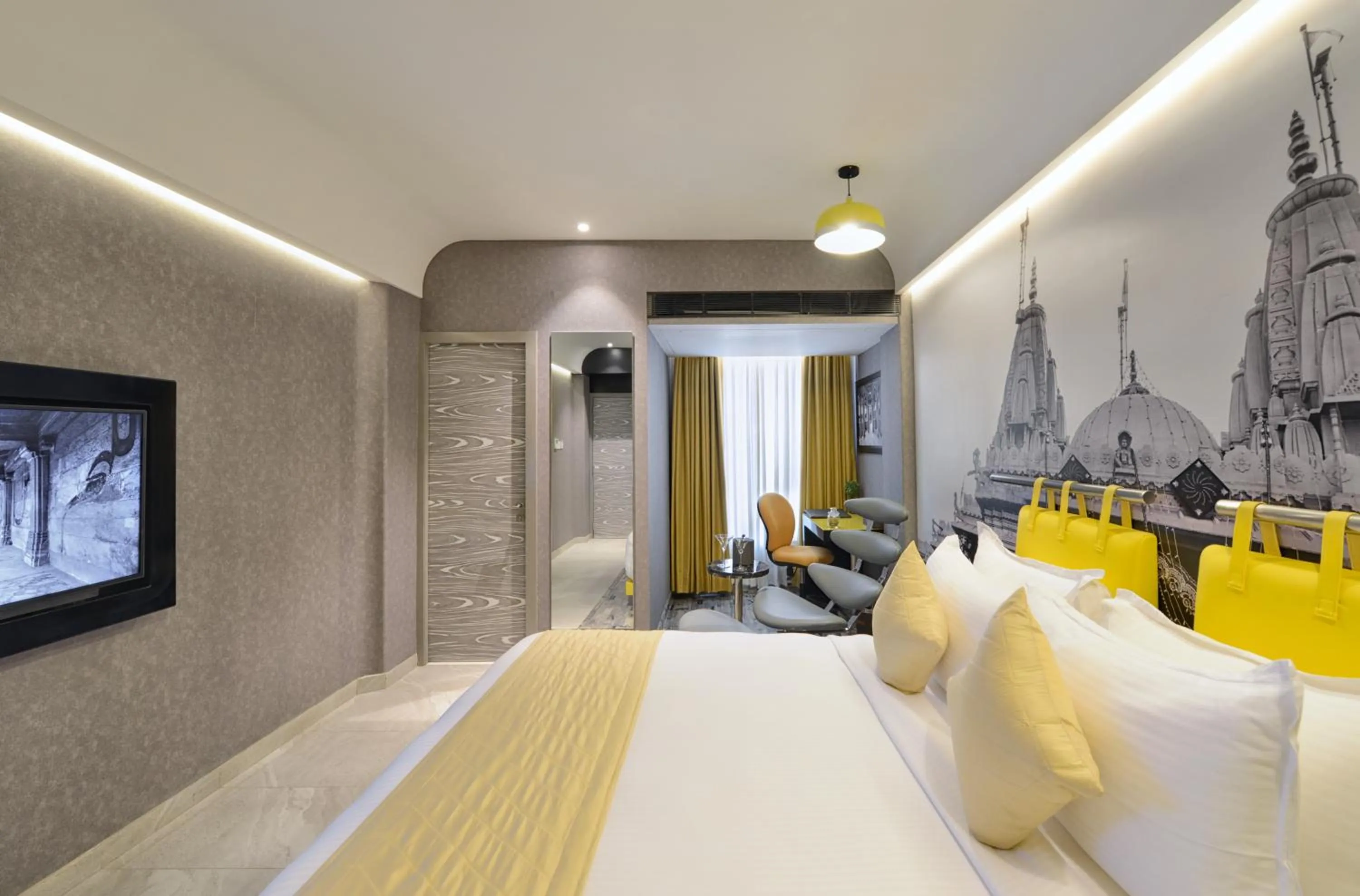 Photo of the whole room, Bed in Regenta Central Antarim Ahmedabad