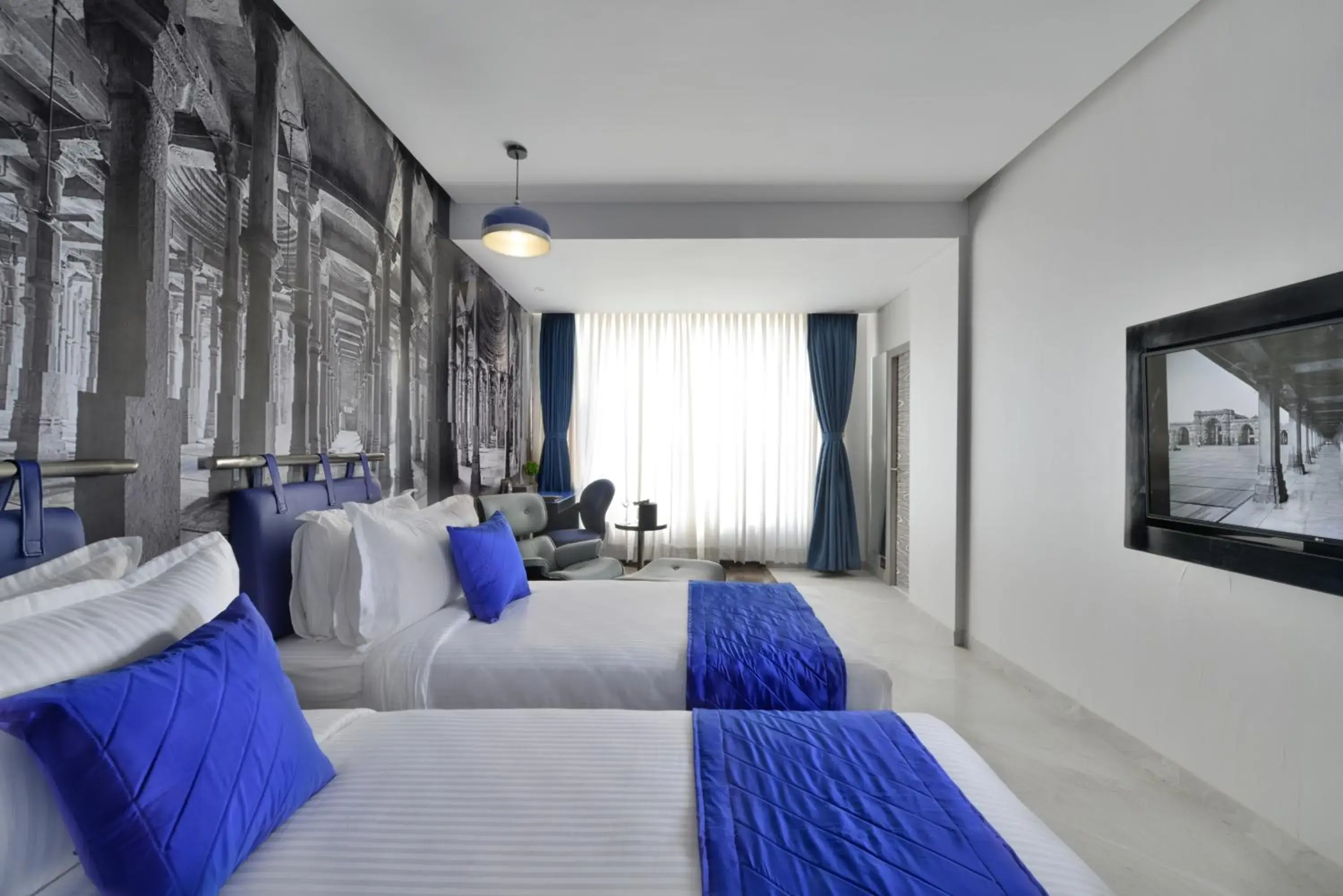 Photo of the whole room, Bed in Regenta Central Antarim Ahmedabad Photo of the whole room, Bed in Regenta Central Antarim Ahmedabad