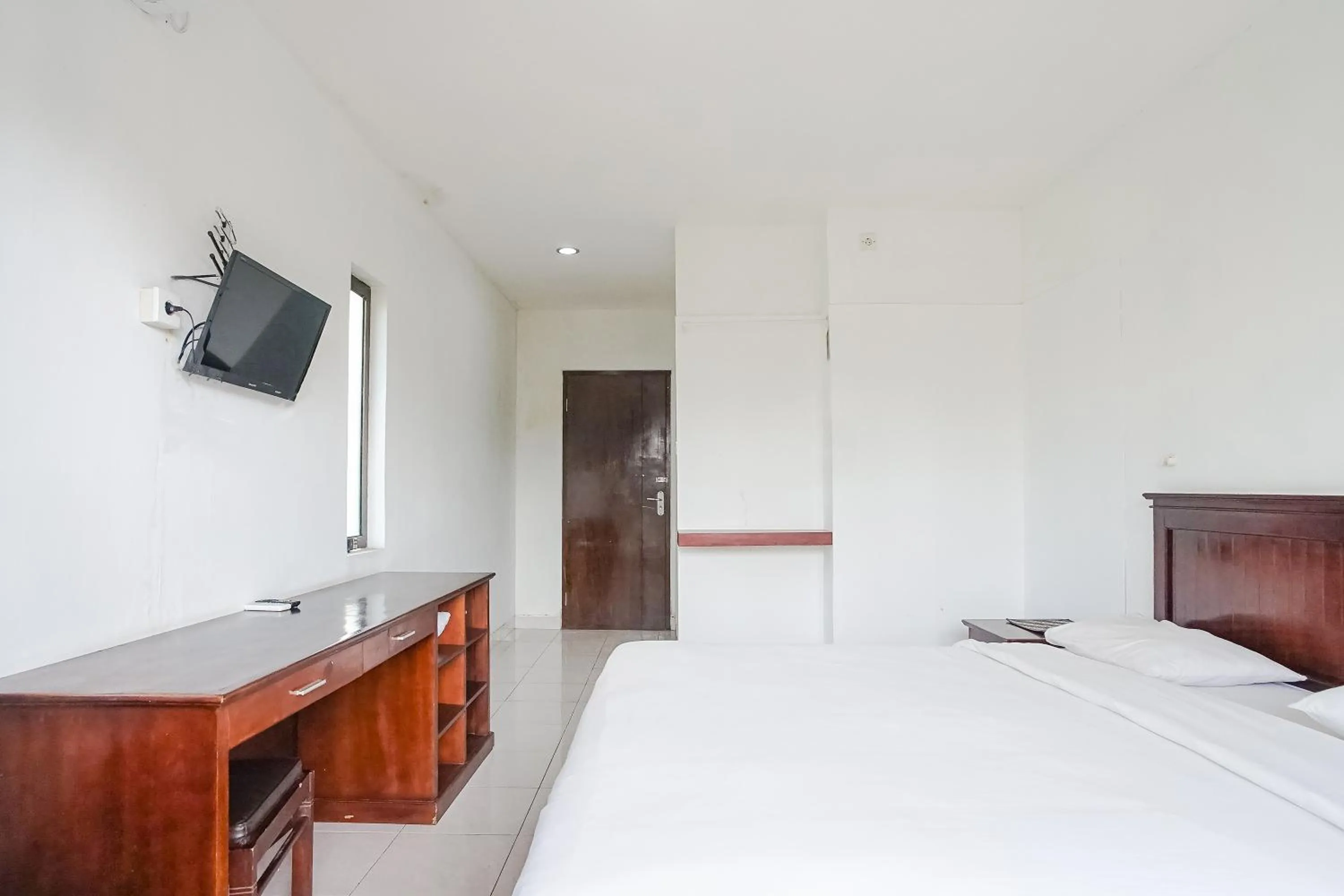 Bed in Indopurejoy House - Komala Indah Cottages