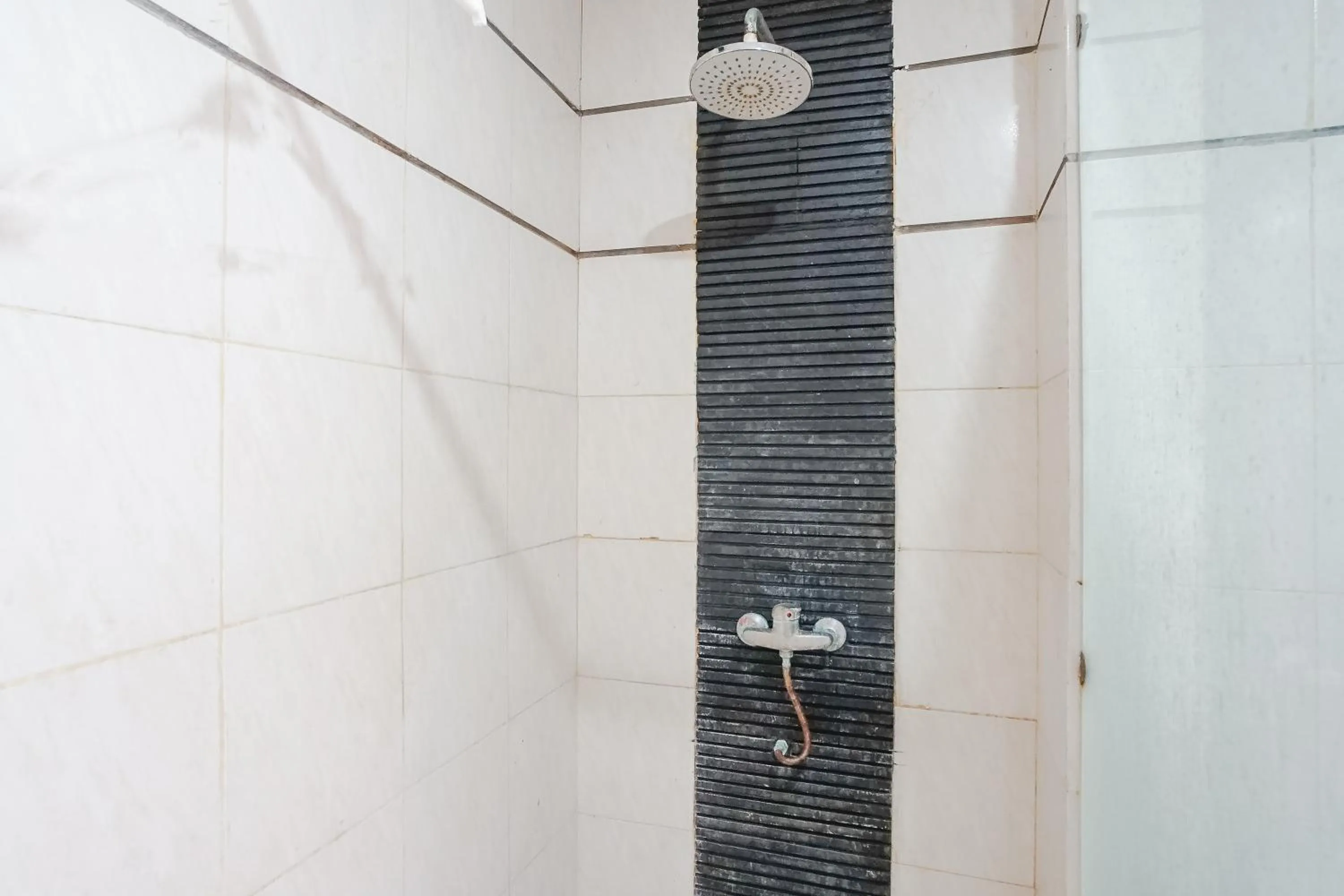 Shower in Indopurejoy House - Komala Indah Cottages