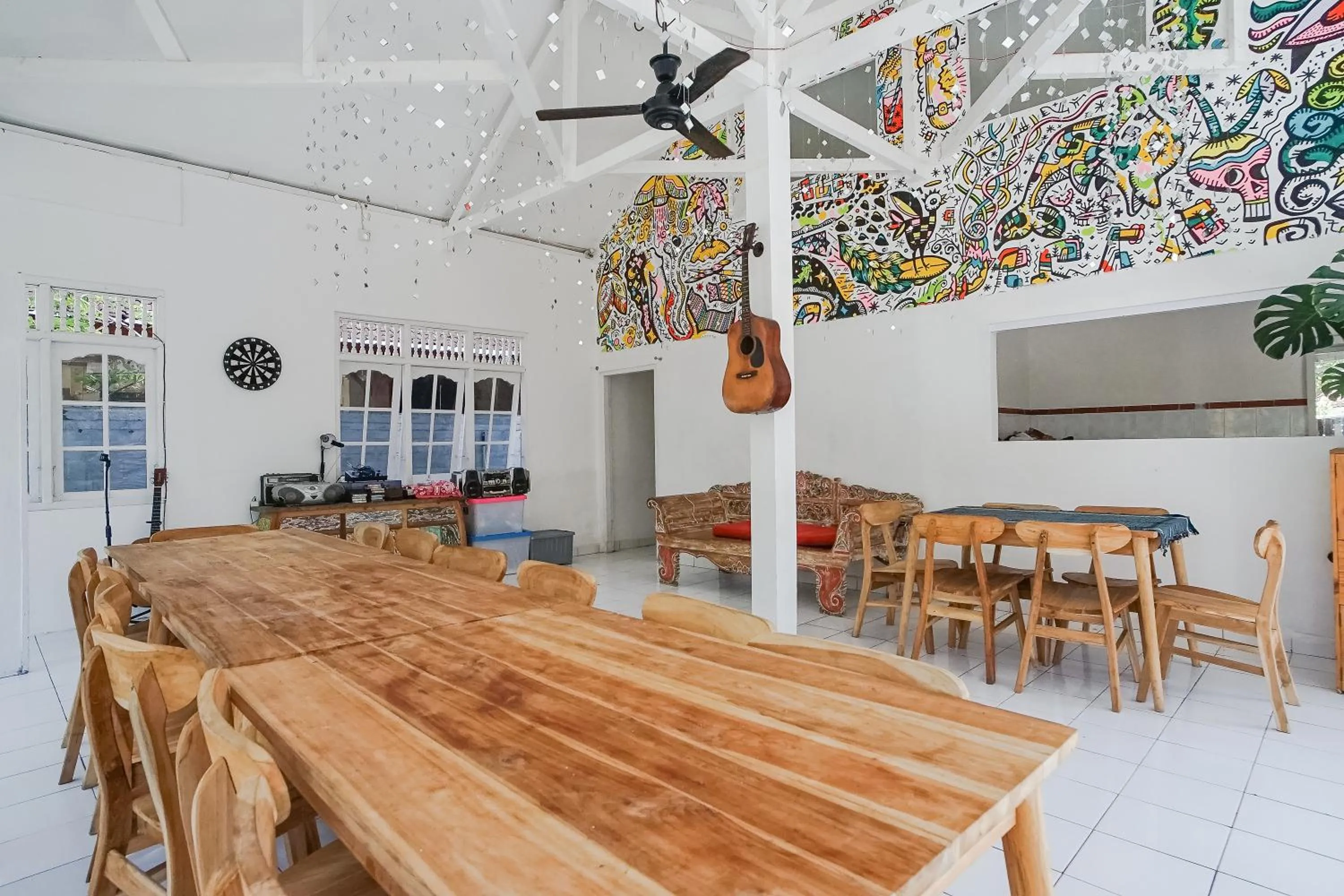 Seating area in Indopurejoy House - Komala Indah Cottages