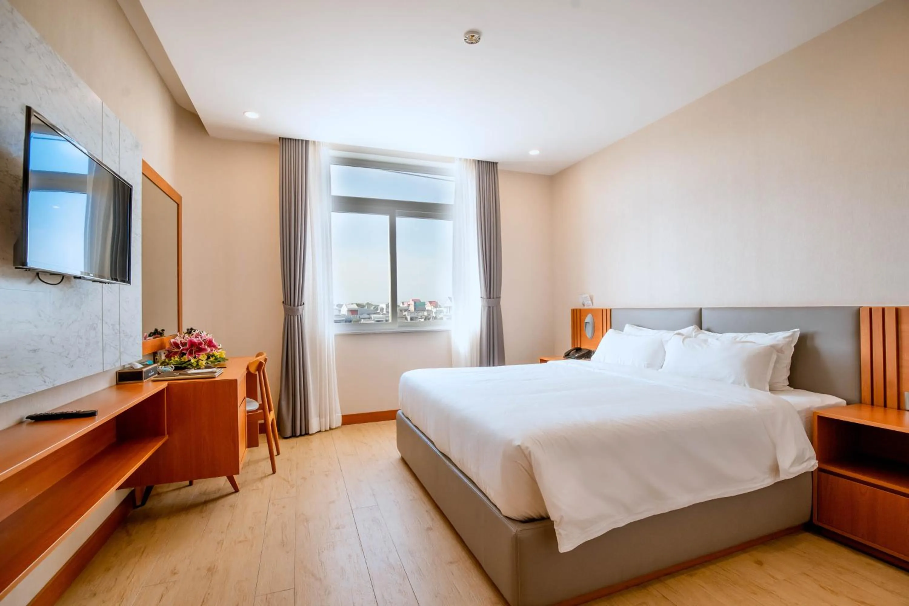 City view, Bed in Bella Vita Hotel