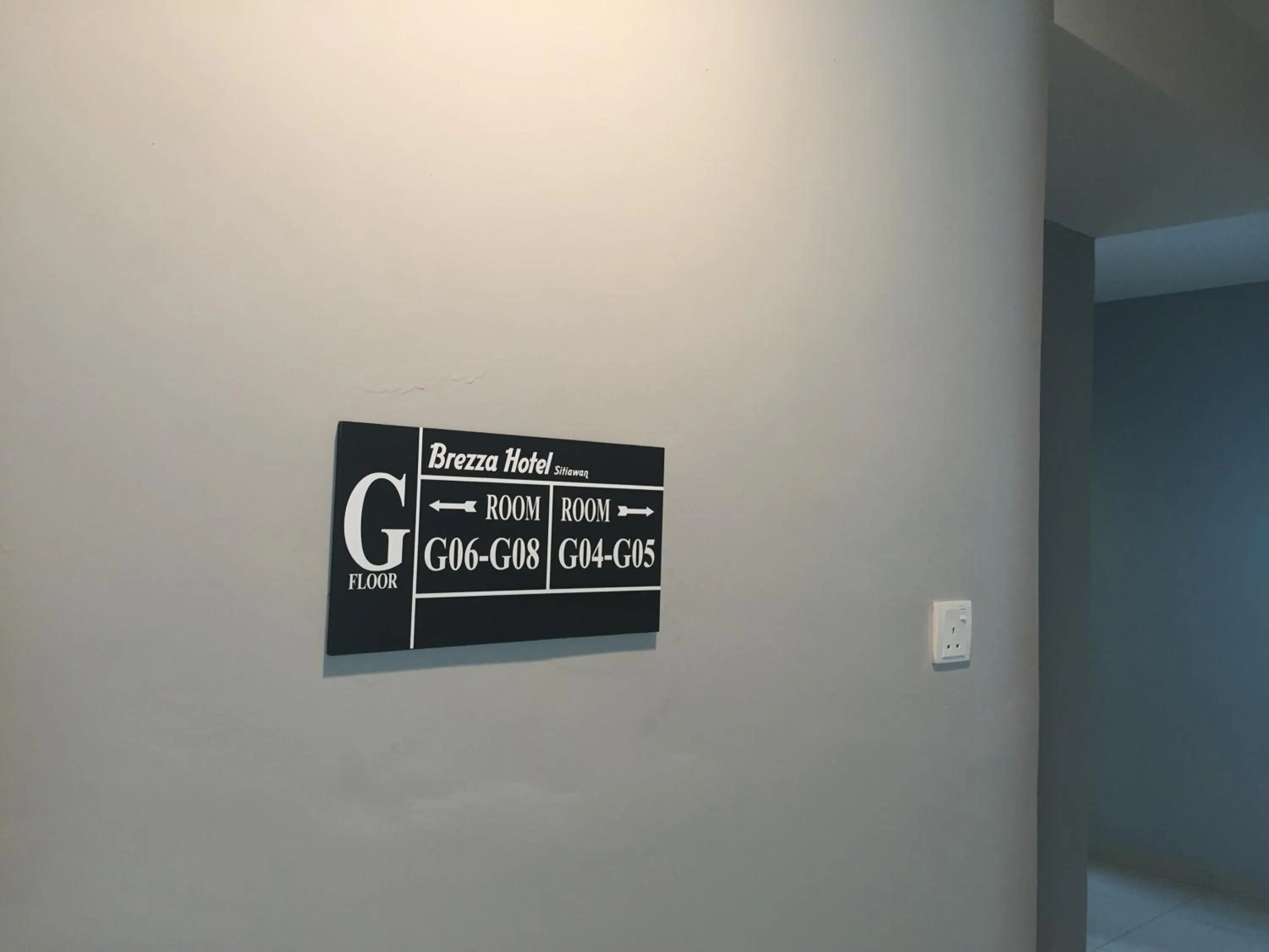 Property logo or sign in Brezza Hotel Sitiawan