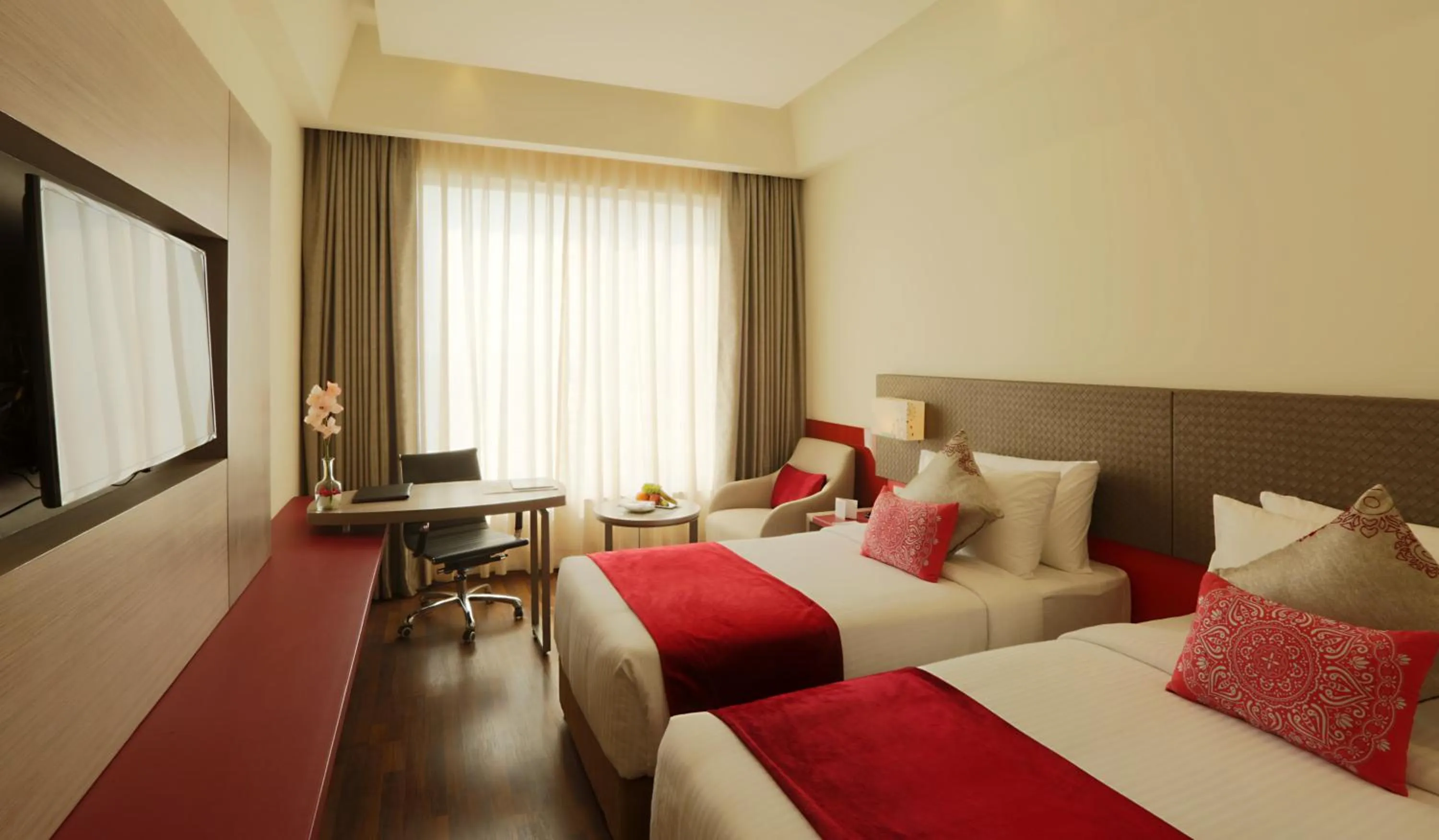 Photo of the whole room, Bed in Ramada by Wyndham Lucknow Hotel and Convention Center