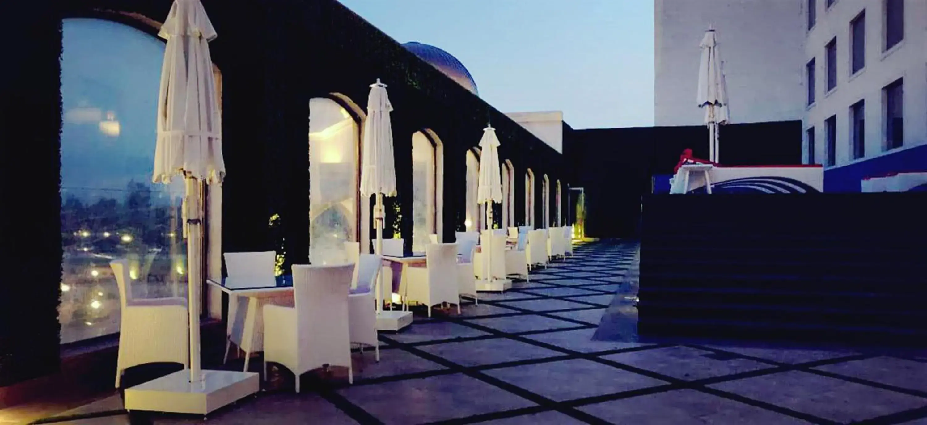 Swimming pool in Ramada by Wyndham Lucknow Hotel and Convention Center Swimming pool in Ramada by Wyndham Lucknow Hotel and Convention Center