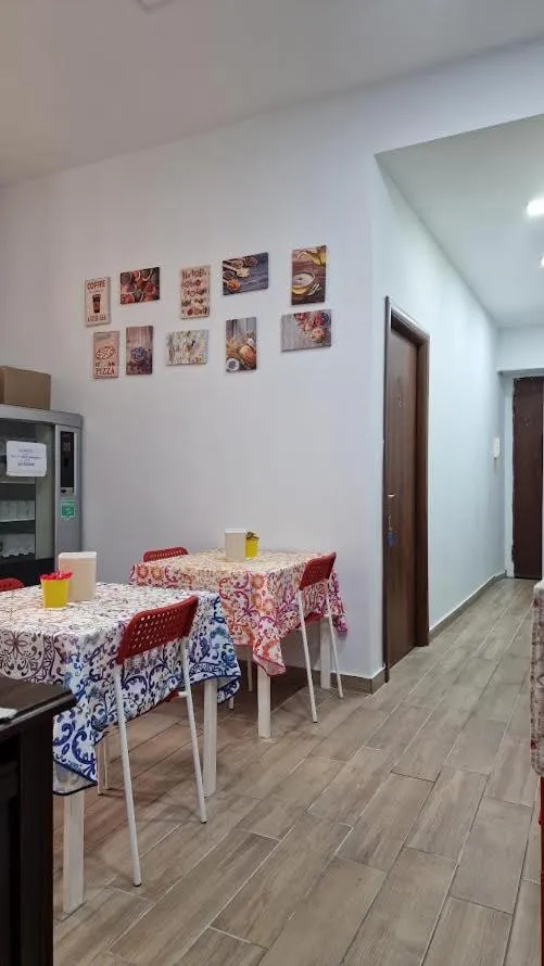 Kitchen or kitchenette in Napoli Station B&B