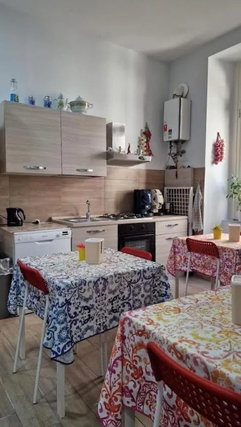 Kitchen or kitchenette in Napoli Station B&B
