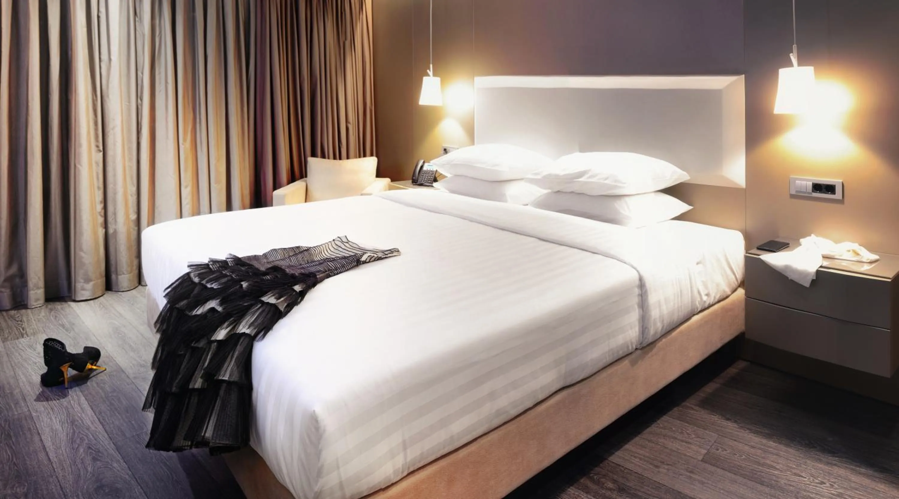 Bed in SAZ City Life Boutique Hotel