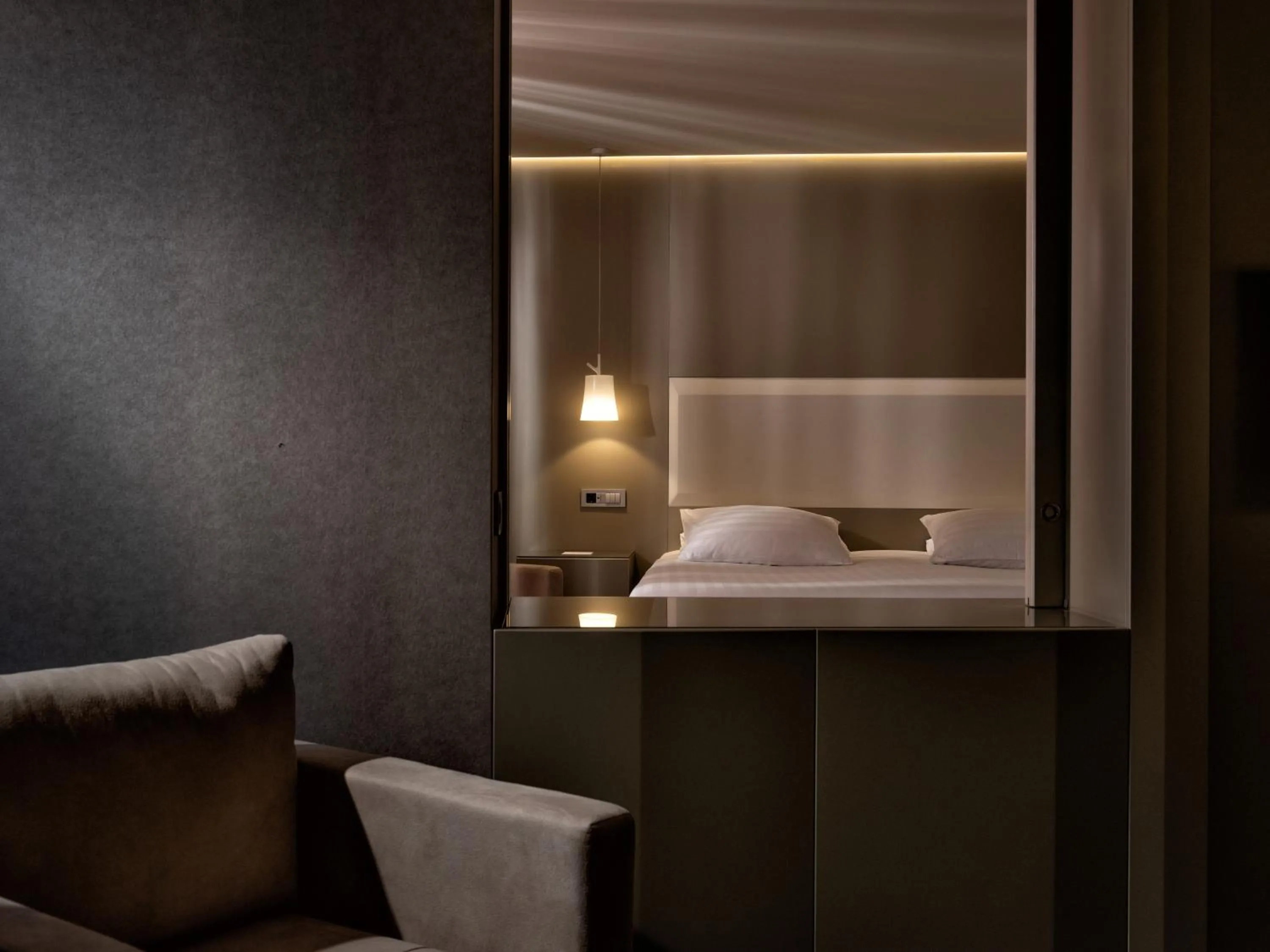 Bed in SAZ City Life Boutique Hotel